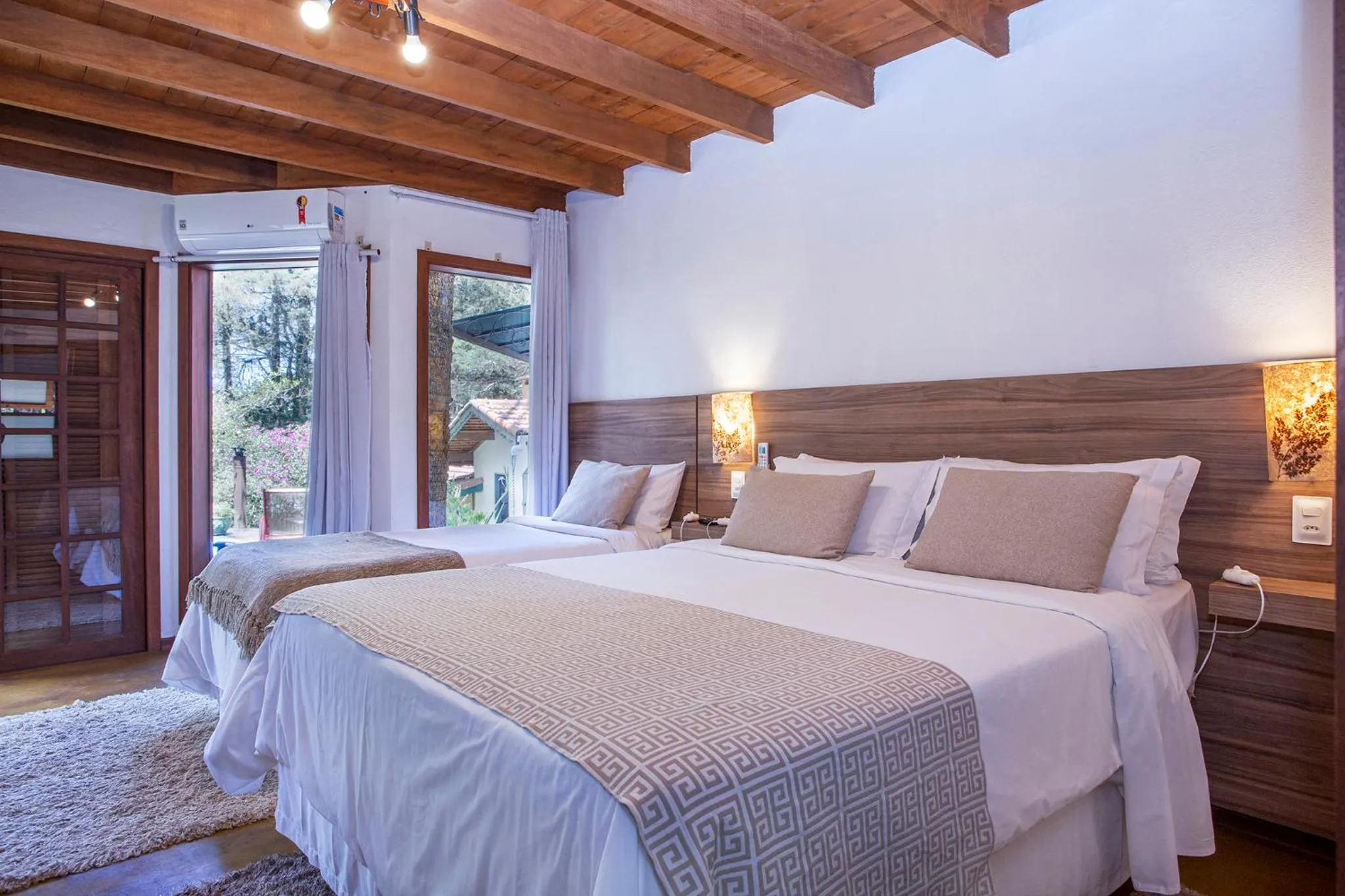 Bed in Pousada Suiça Mineira Garden