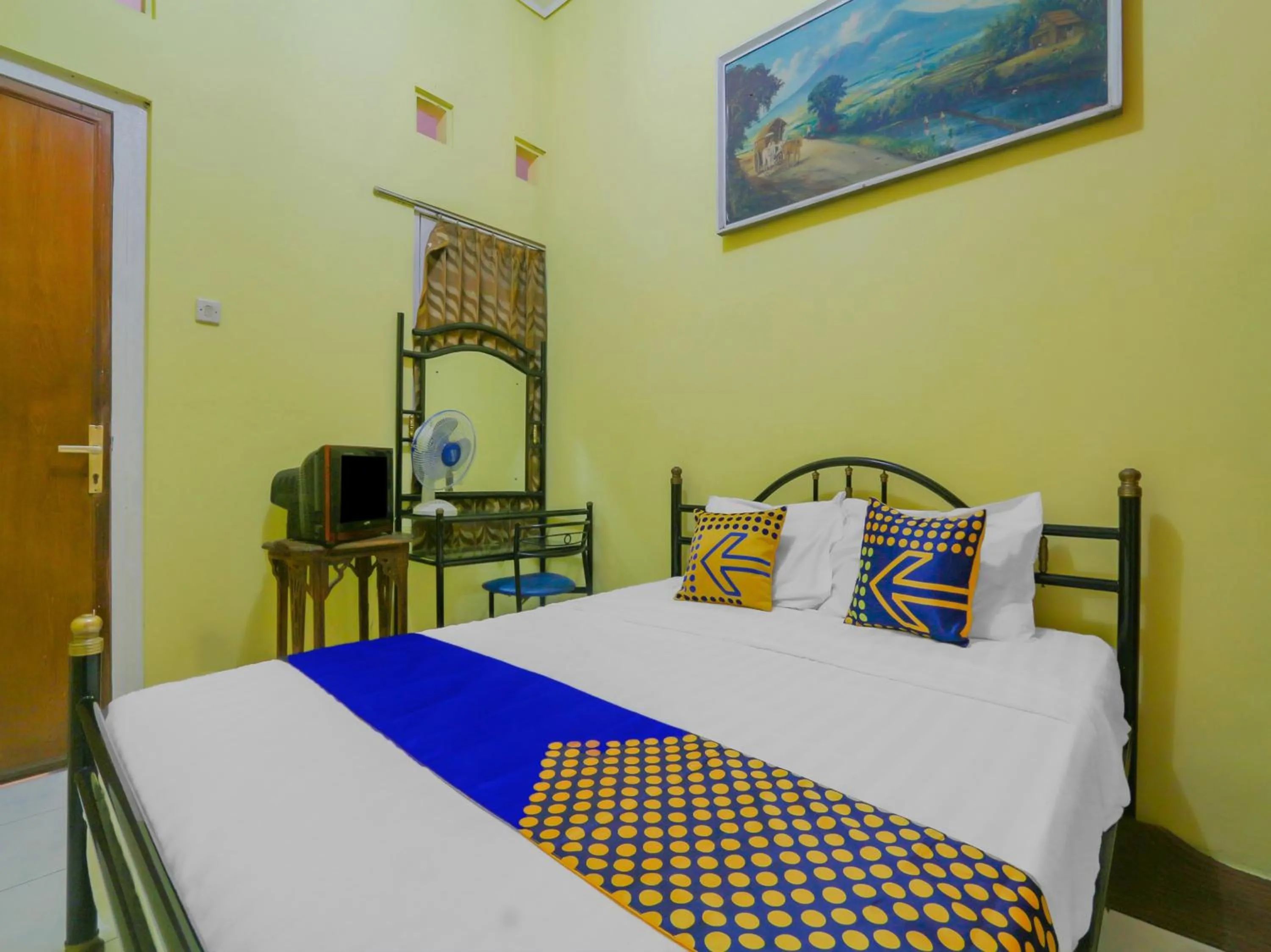 Bedroom in SPOT ON 90272 Istana Griya 1 Hotel