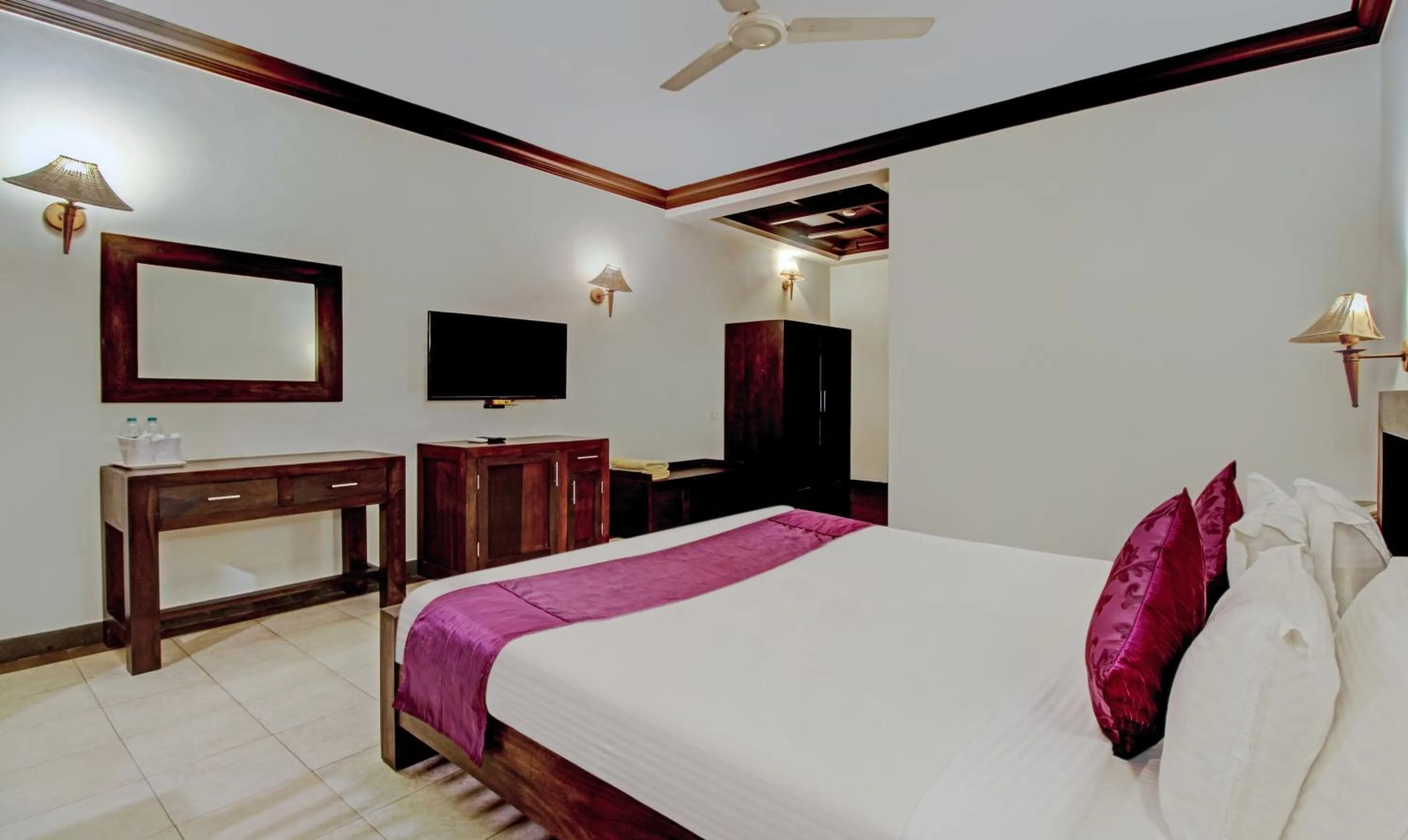 Bedroom, Bed in Treebo Premium Travancore Palace Cherthala
