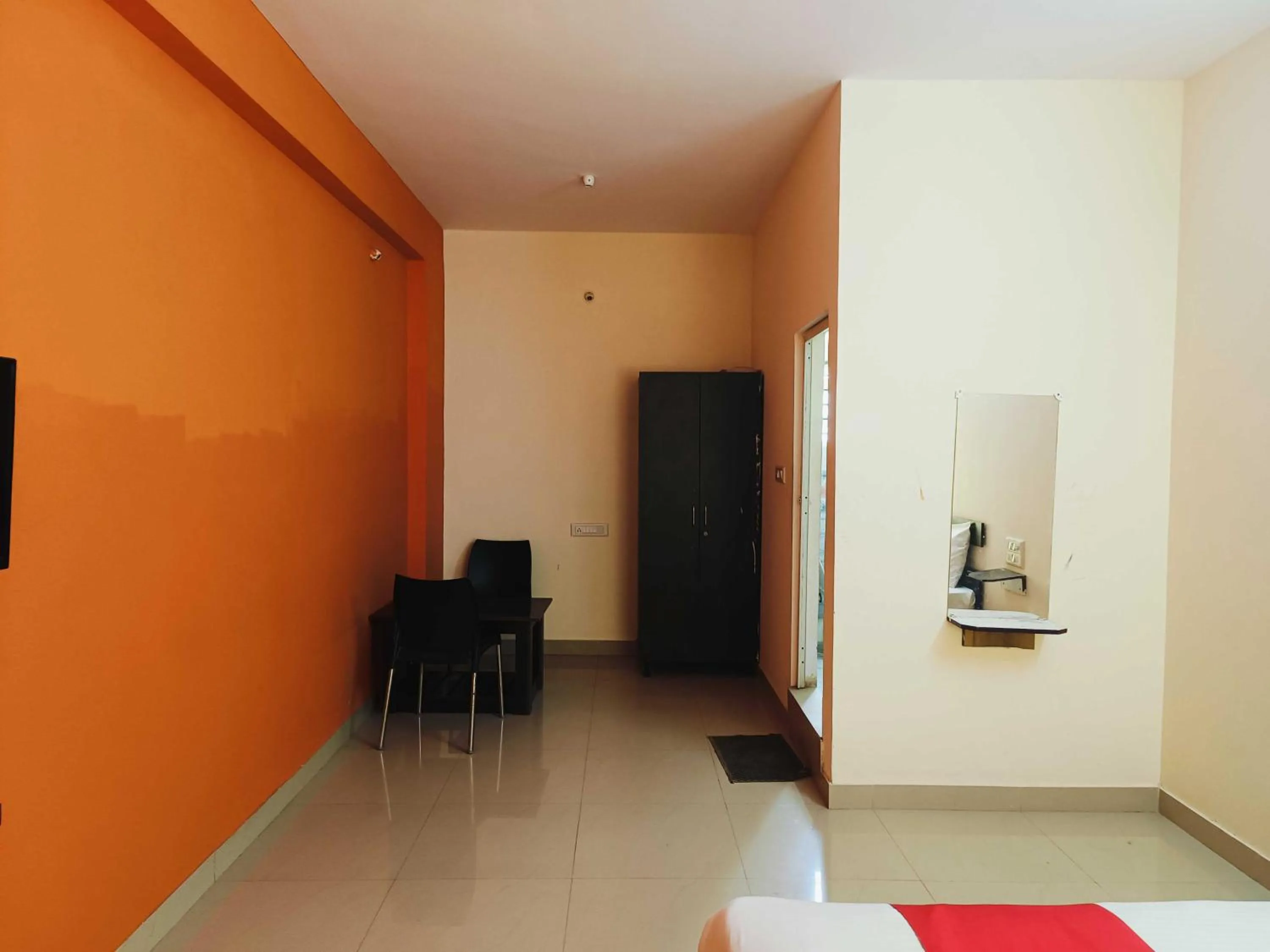 Bedroom in Hotel O P N K Suites