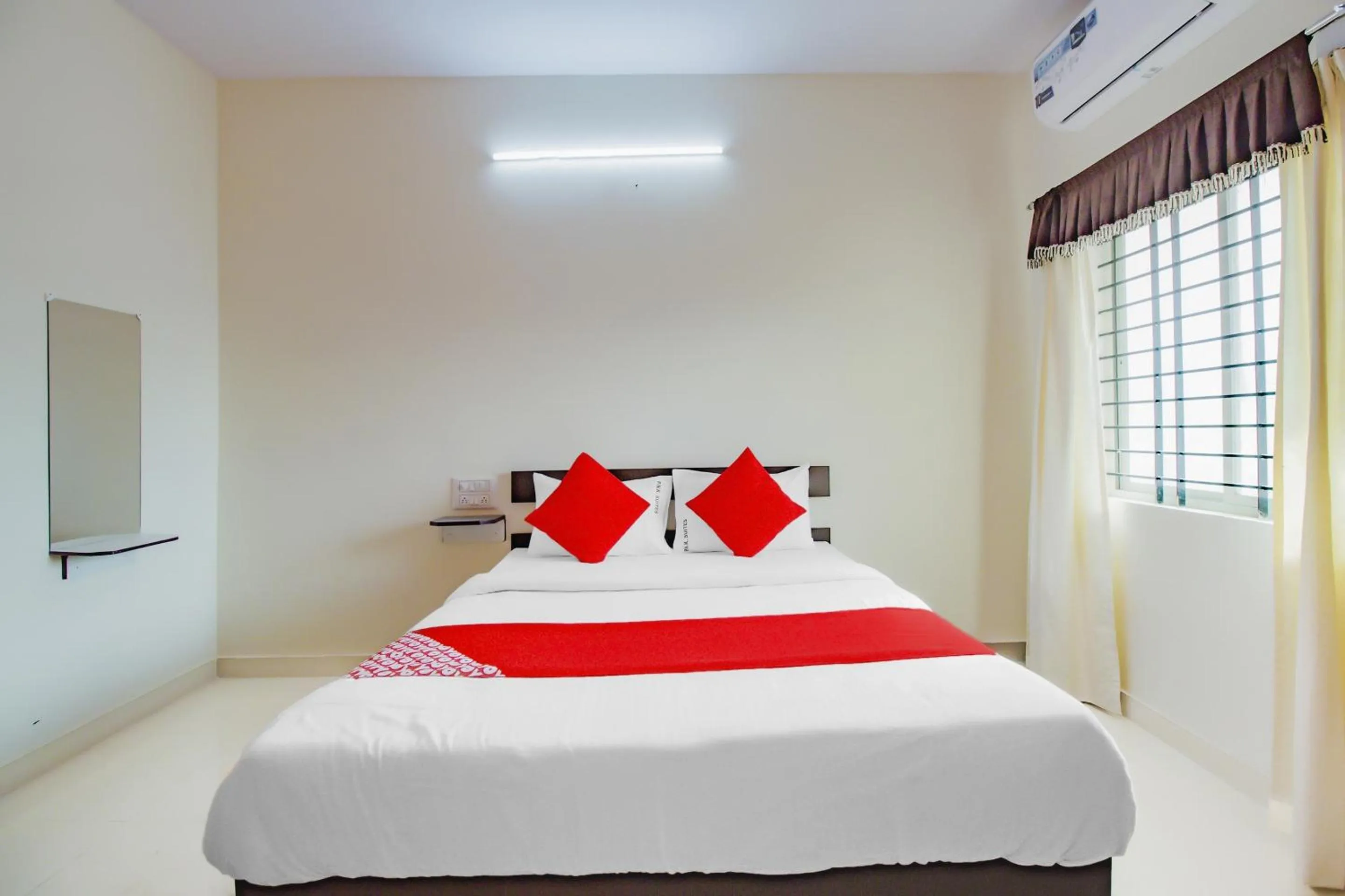 Bedroom in Hotel O P N K Suites