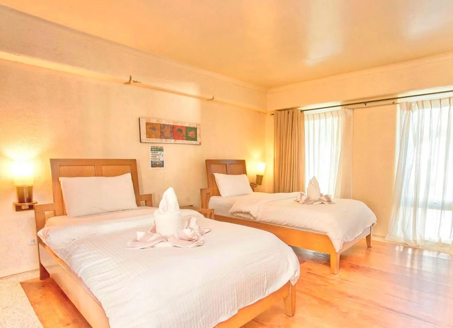 Bed in Mayumi Beach Villa