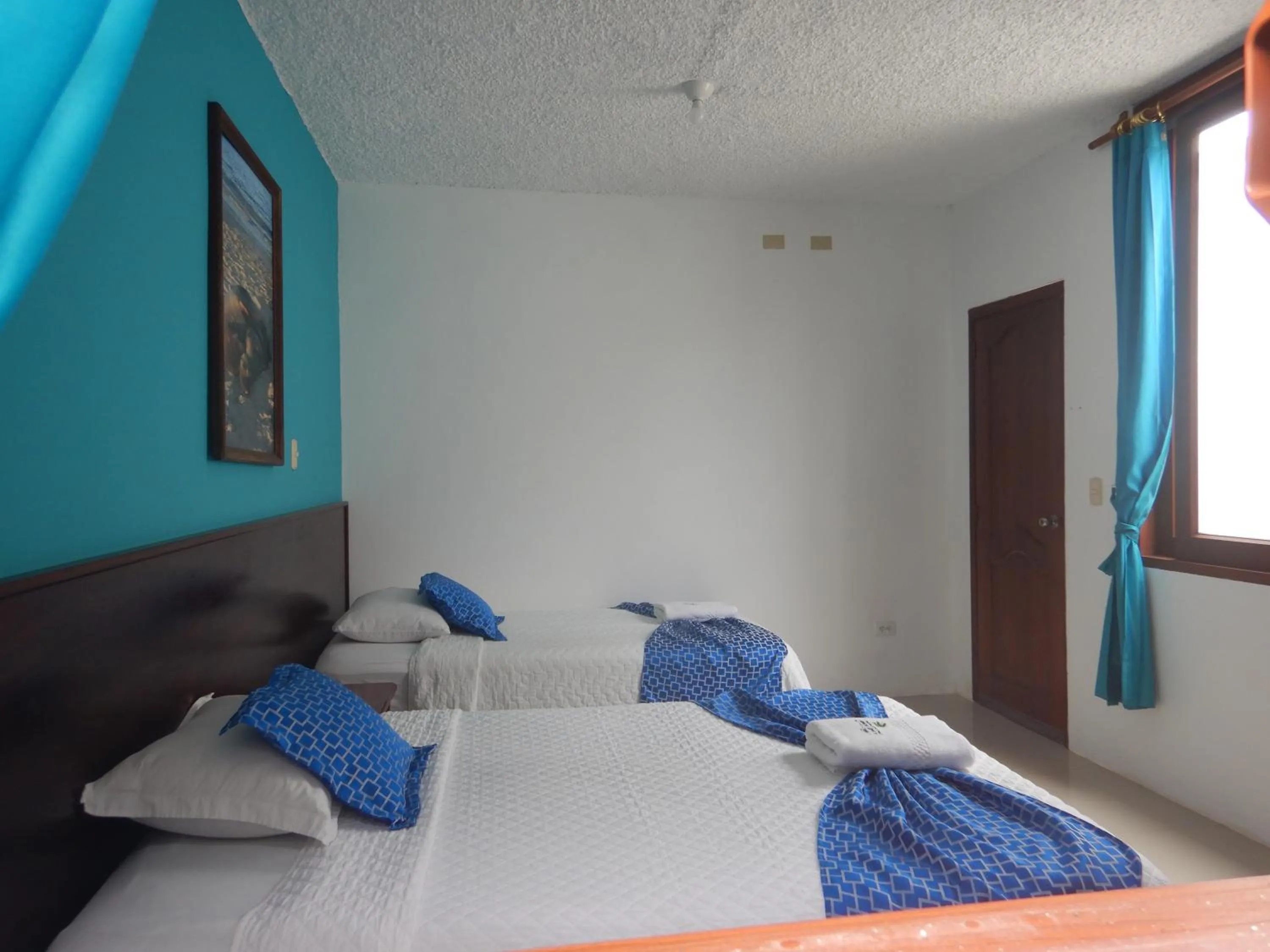 Bed in Hotel LA GRAN TORTUGA - ᯤ STARLINK