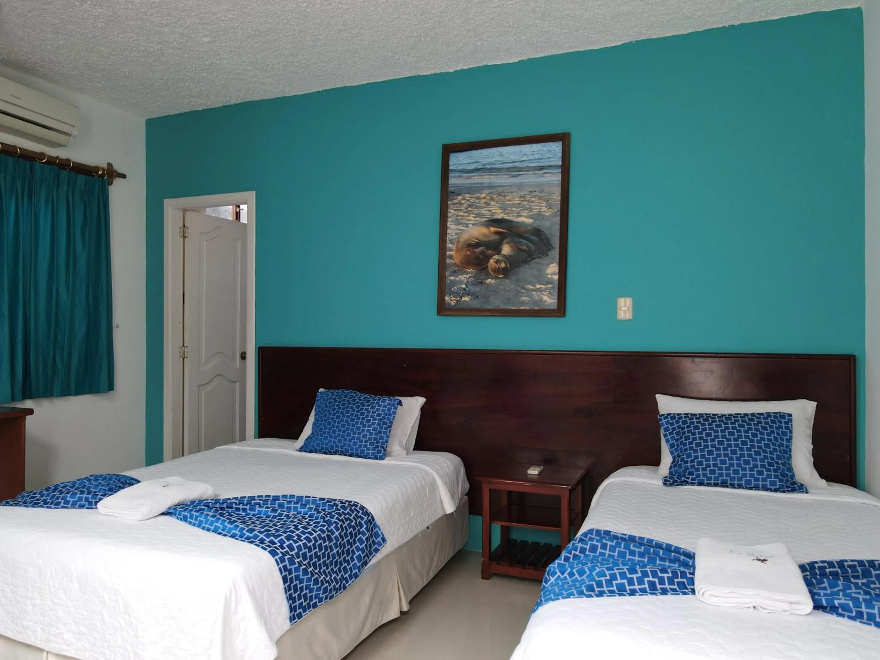 Photo of the whole room, Bed in Hotel LA GRAN TORTUGA - ᯤ STARLINK