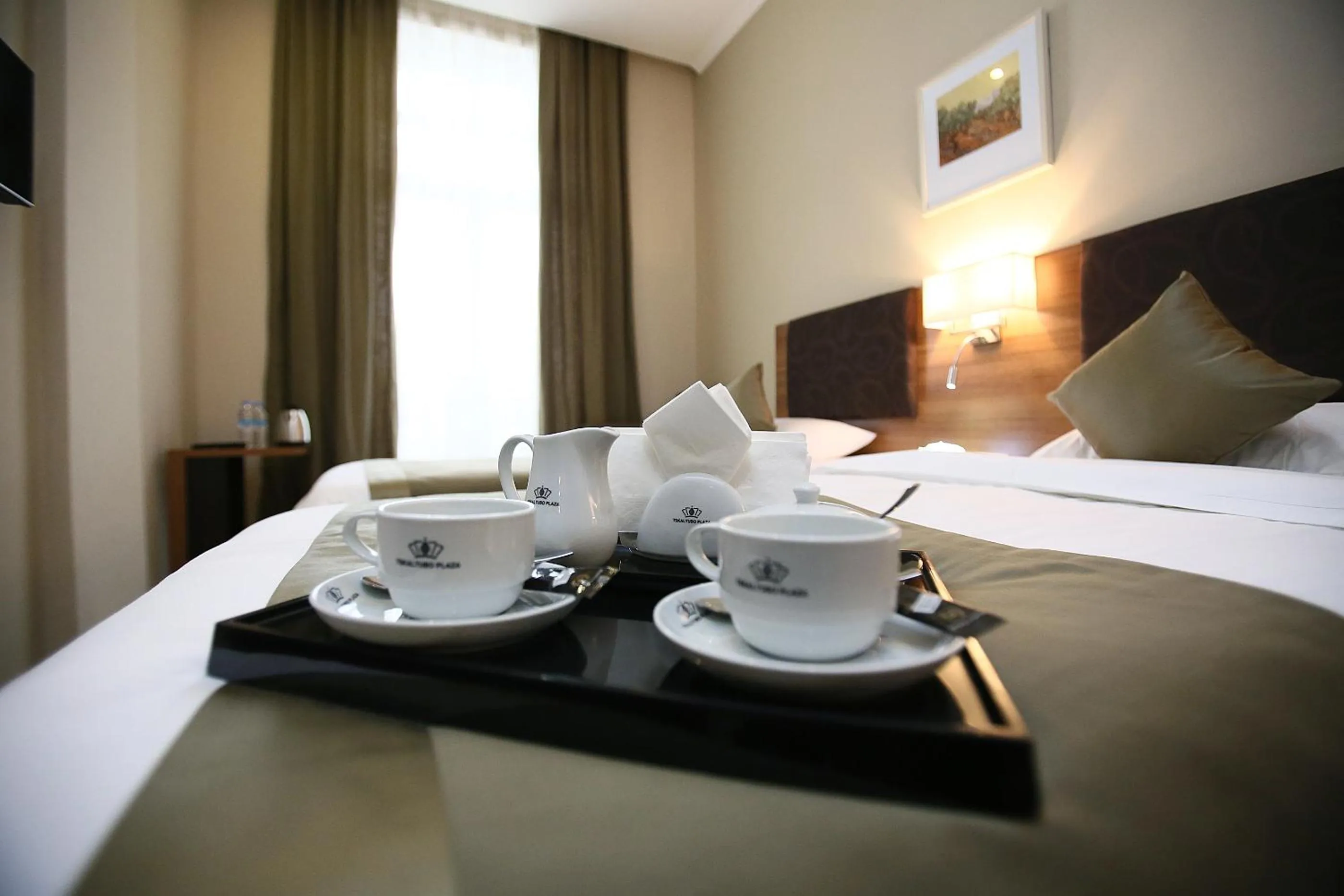 Coffee/tea facilities, Bed in Tskaltubo Plaza Hotel