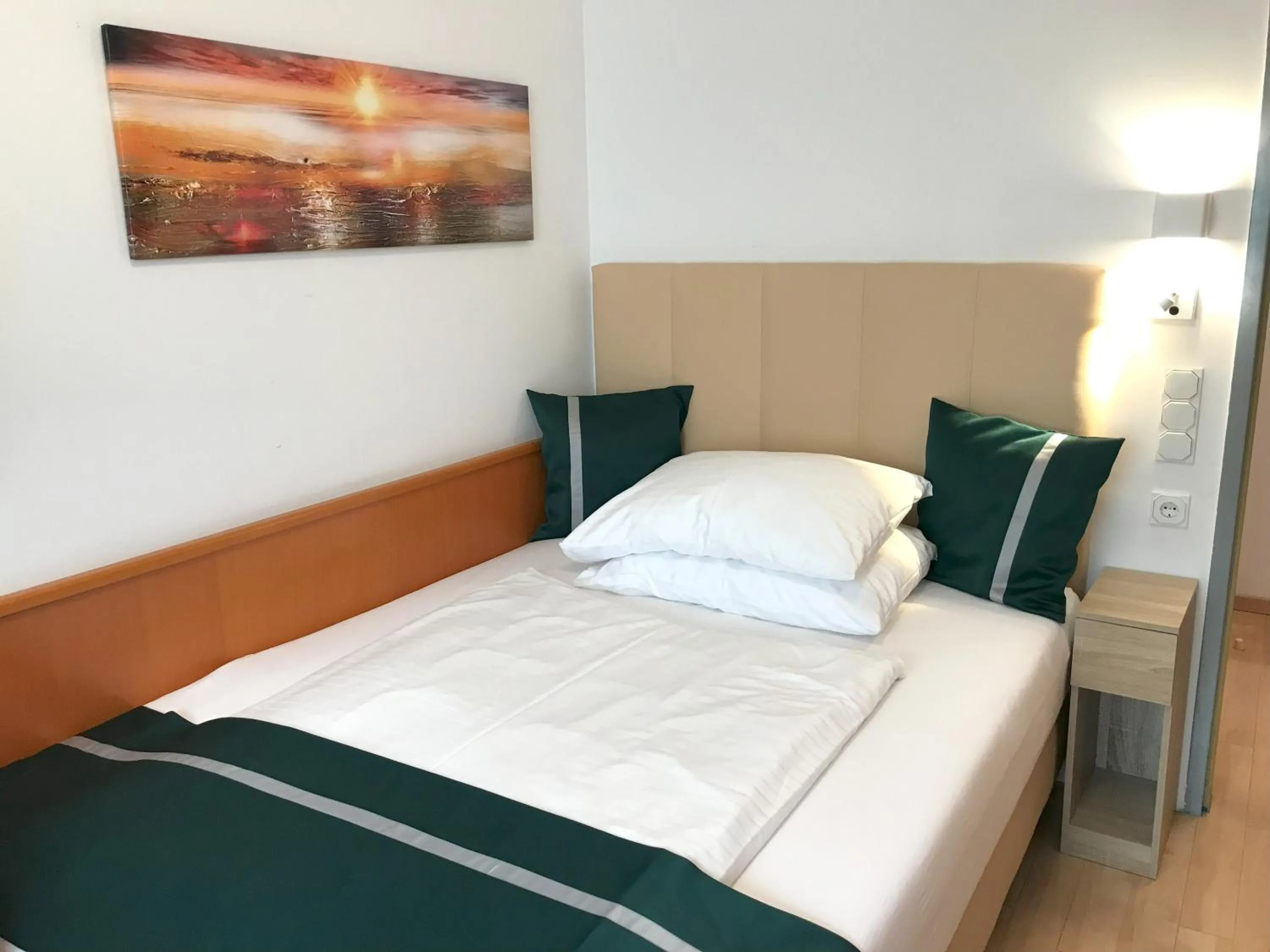 Bed in City Hotel Albrecht