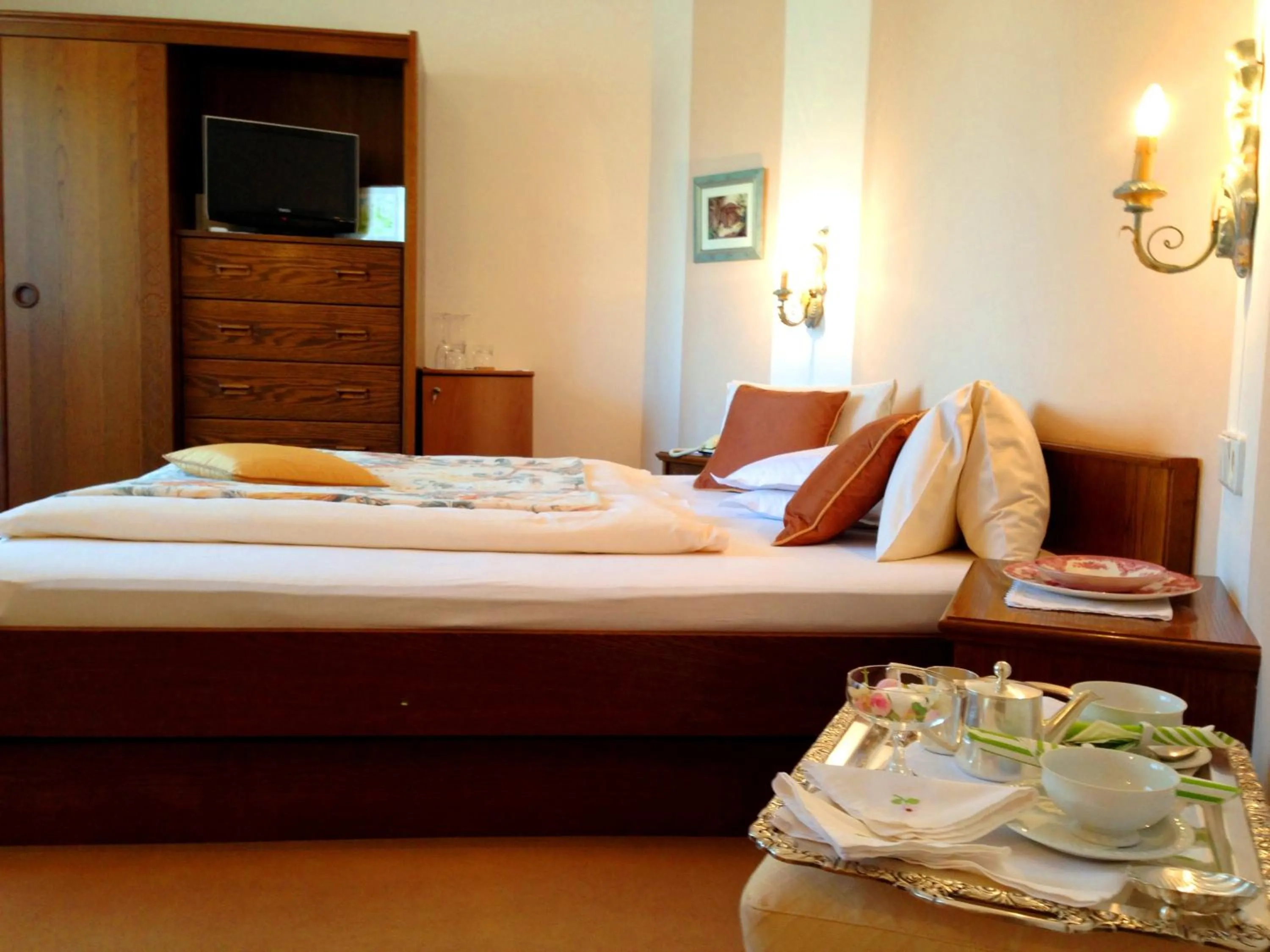 Bed in Dietrichsteinerhof Apartments & Rooms