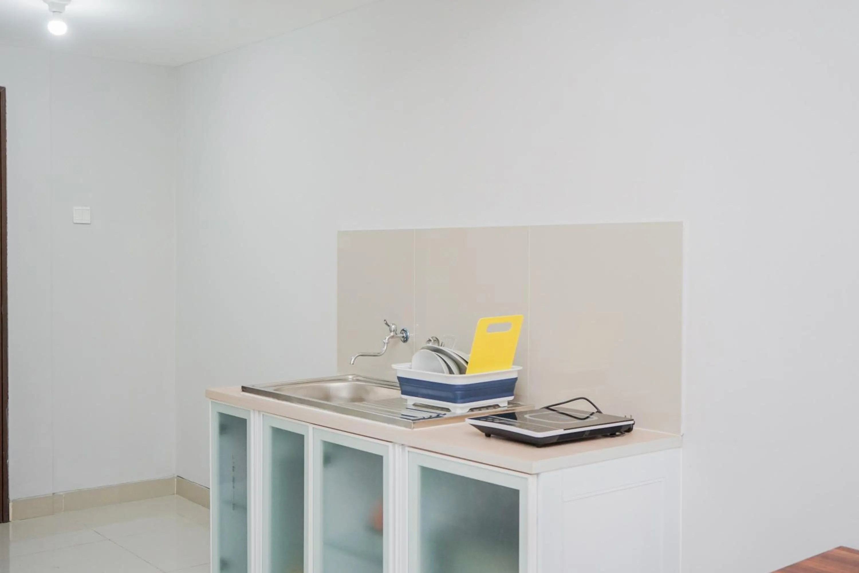 Fully Furnished Studio with Comfort Design Majestic Point Serpong Apartment By Travelio