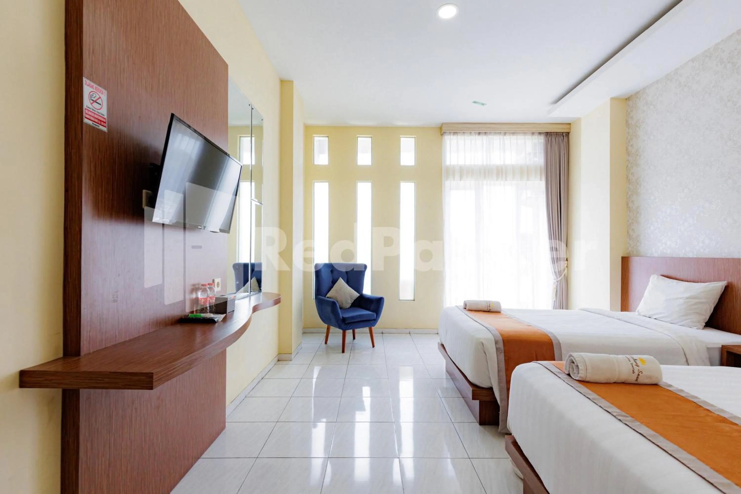 Bedroom in De Malang Sweet Homestay Syariah Mitra RedDoorz