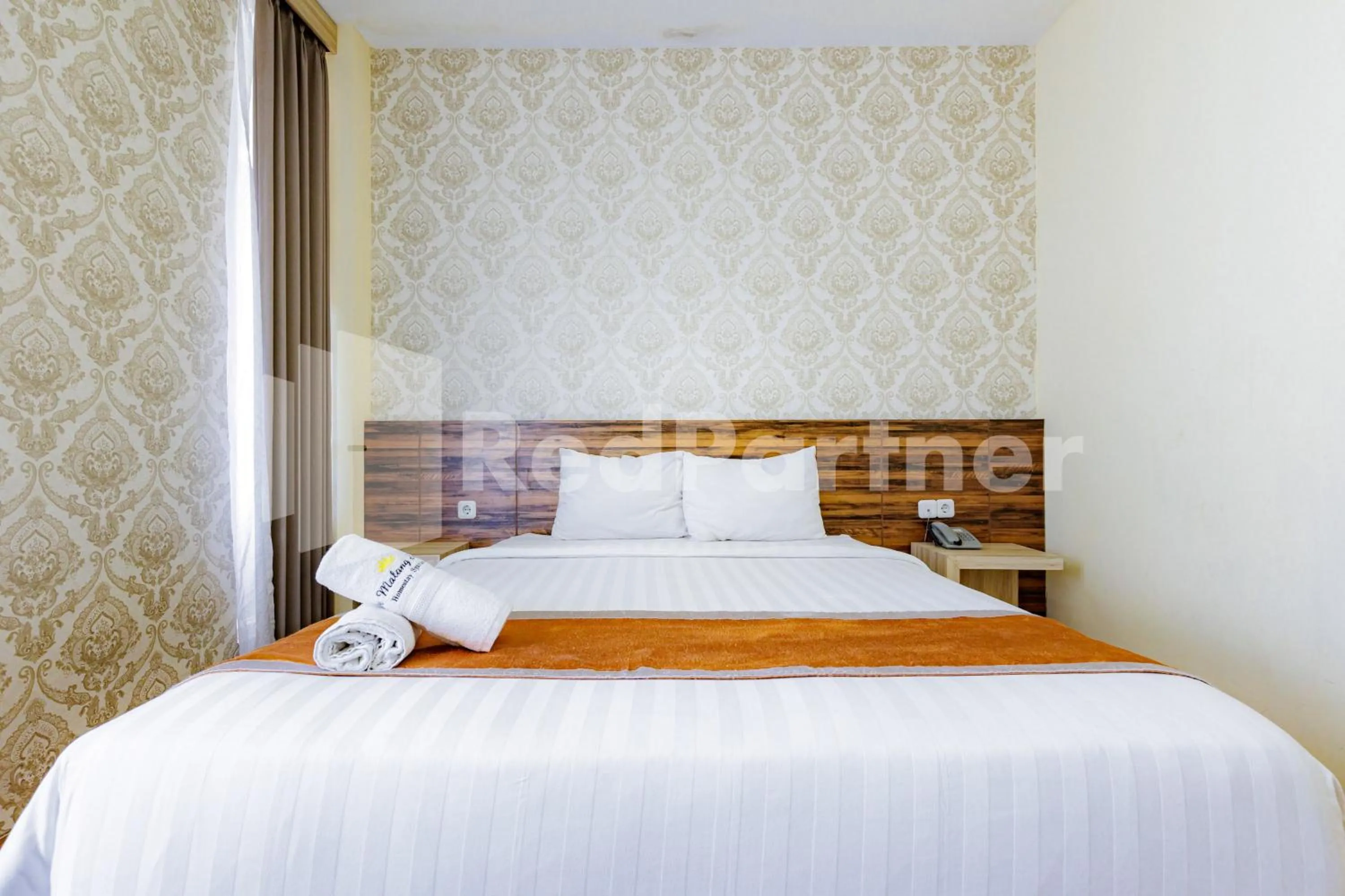 Bedroom, Bed in De Malang Sweet Homestay Syariah Mitra RedDoorz