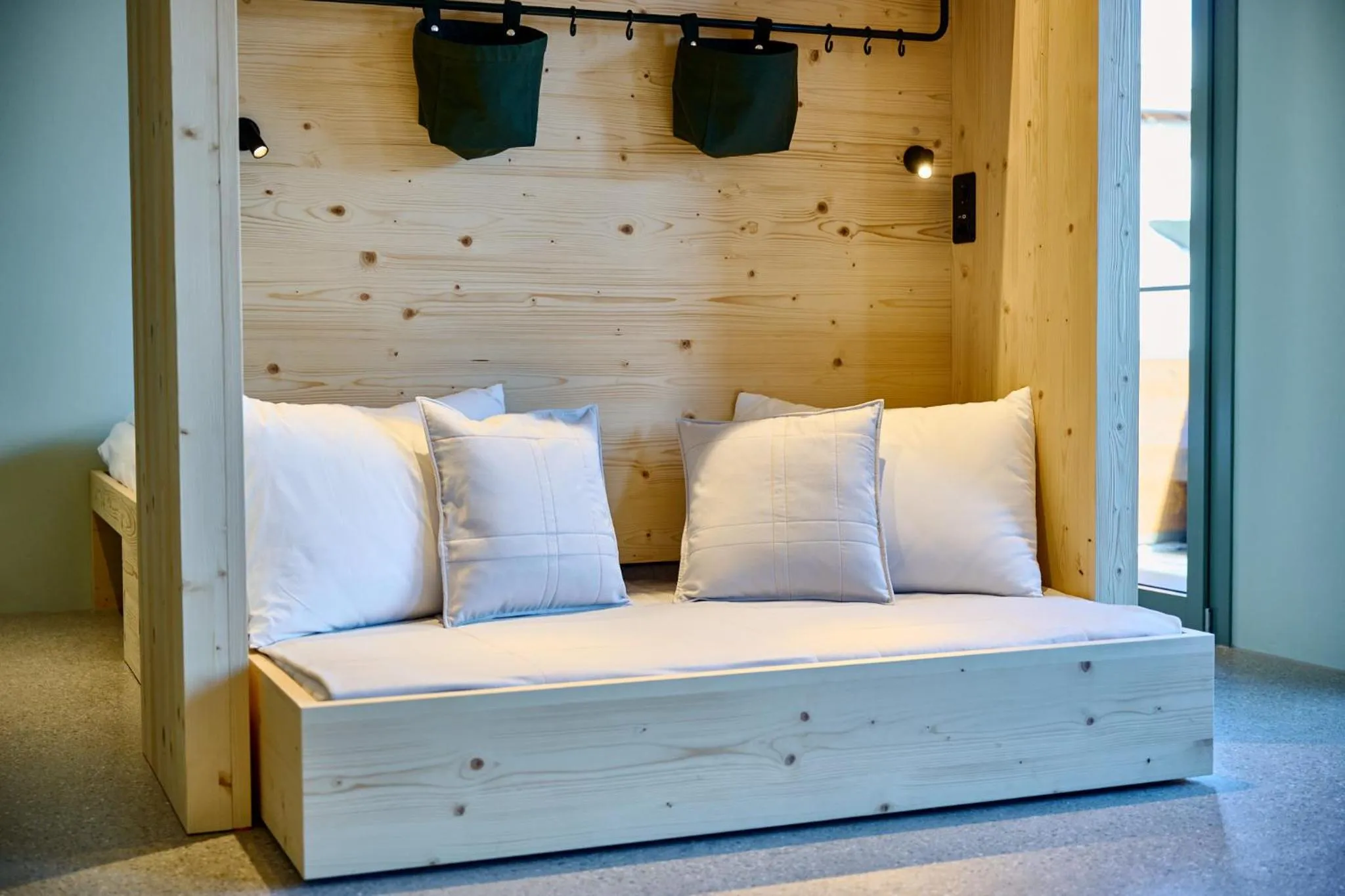 Living room, Bed in Apart Hotel Adelboden am Dorfplatz