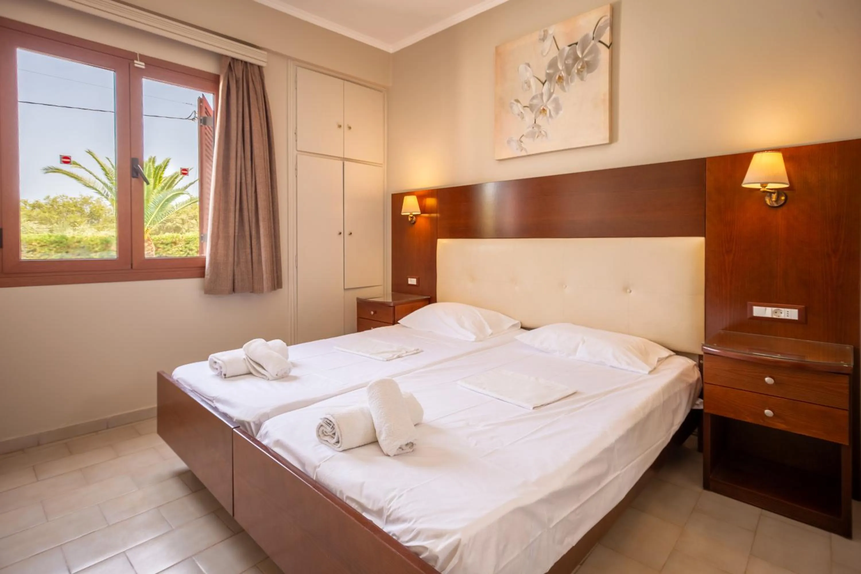 Bed in Rose Club Apartments