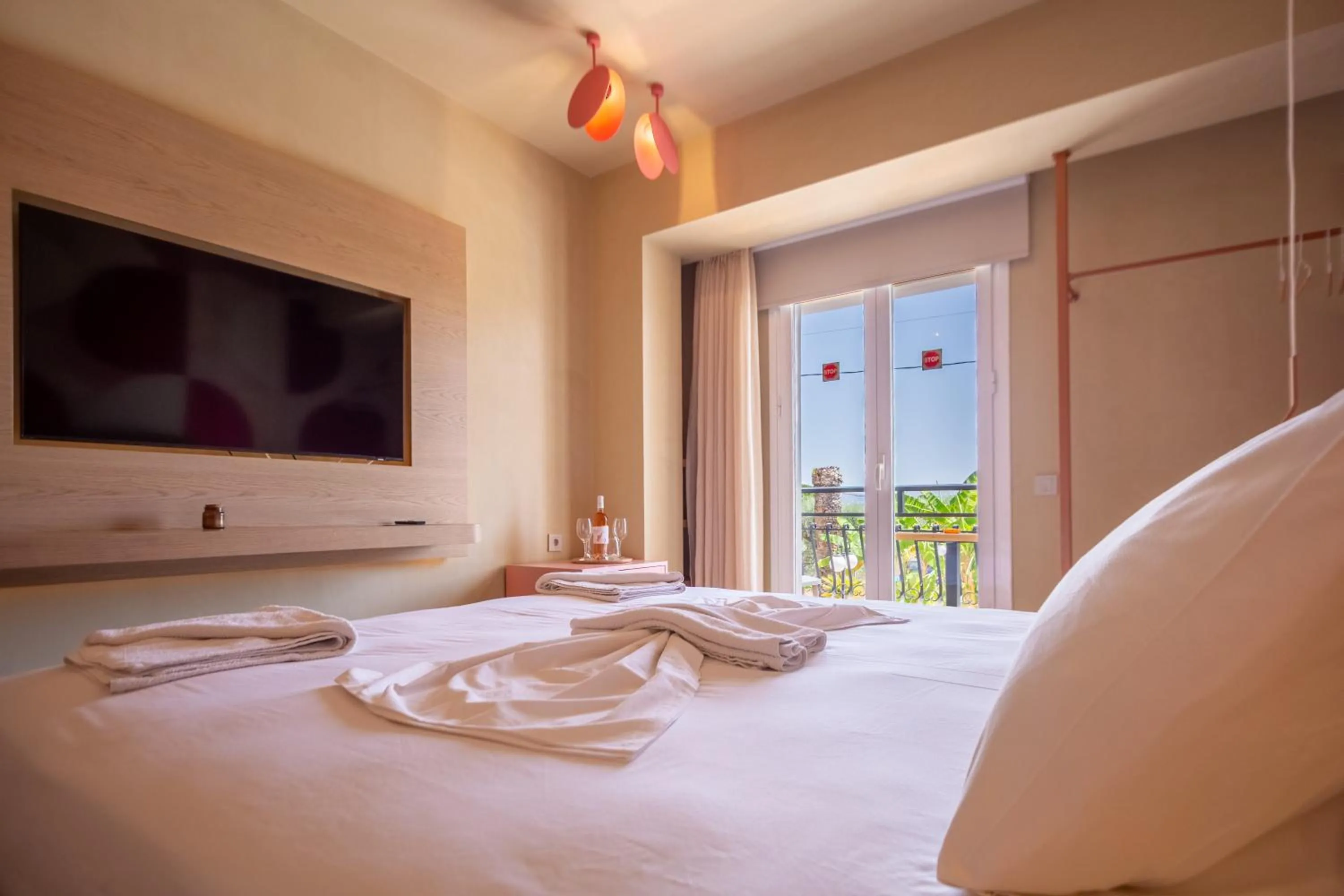 Bed in Rose Club Apartments