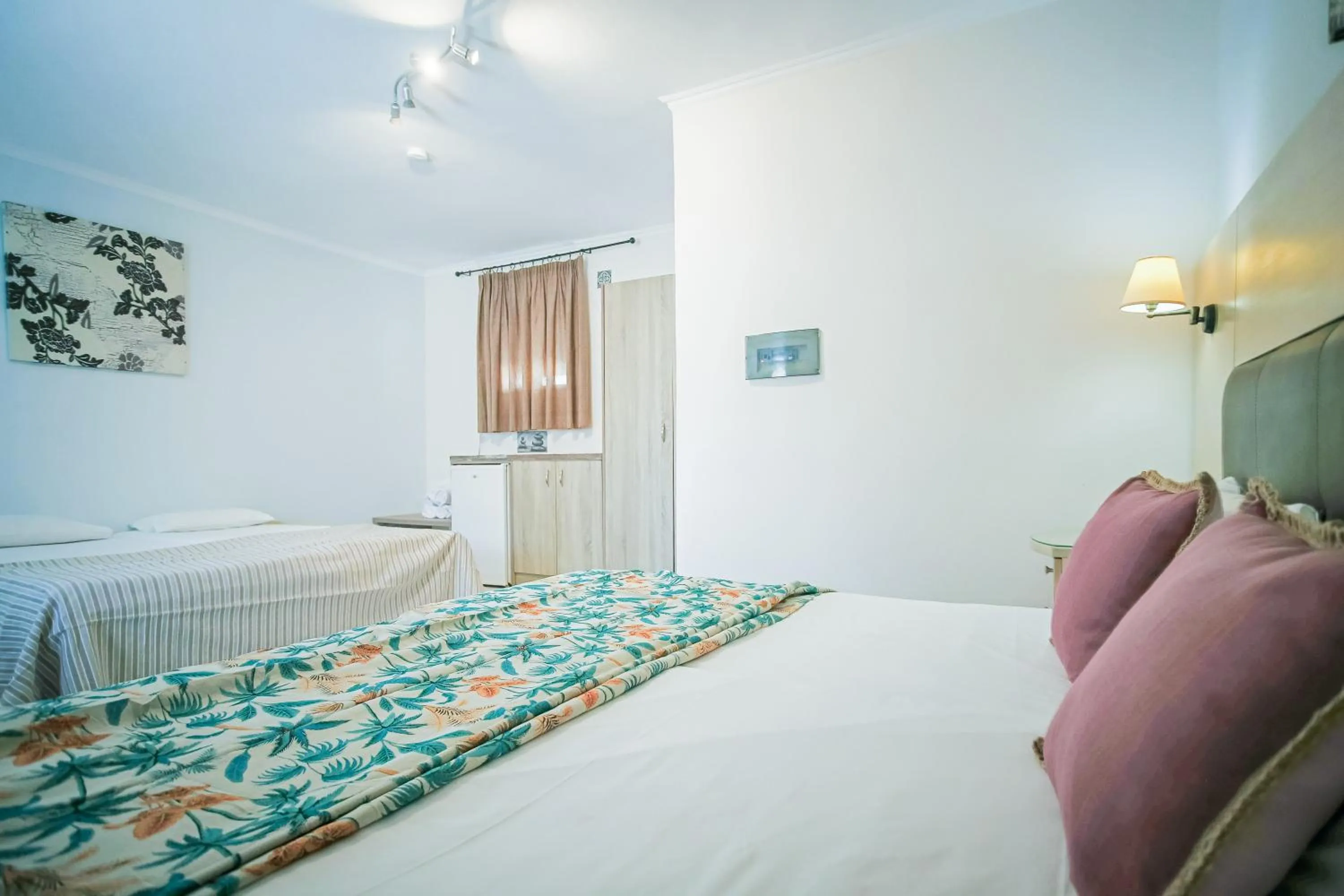 Bed in Rose Club Apartments