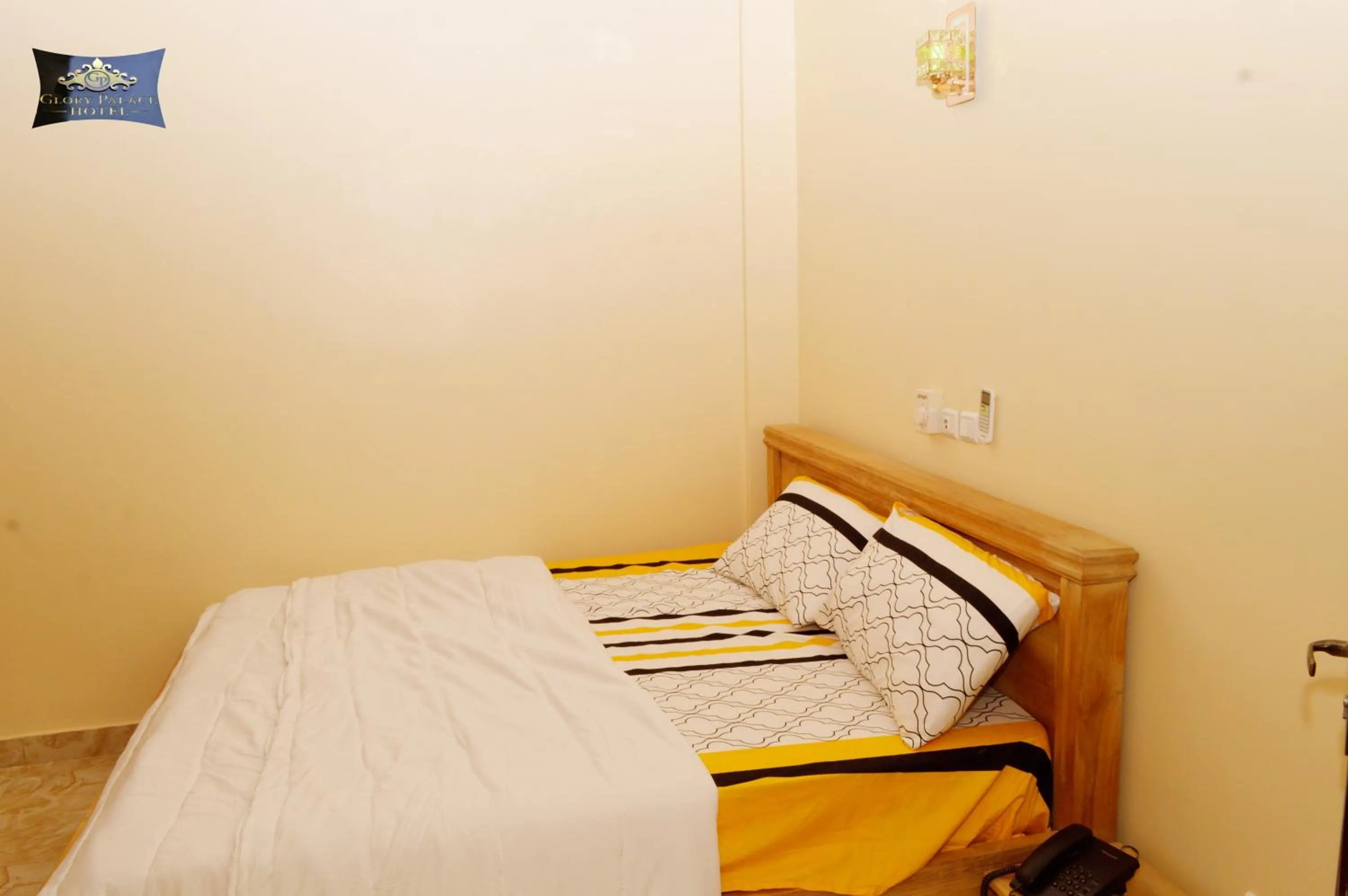 Bed in Glory Palace Hotel