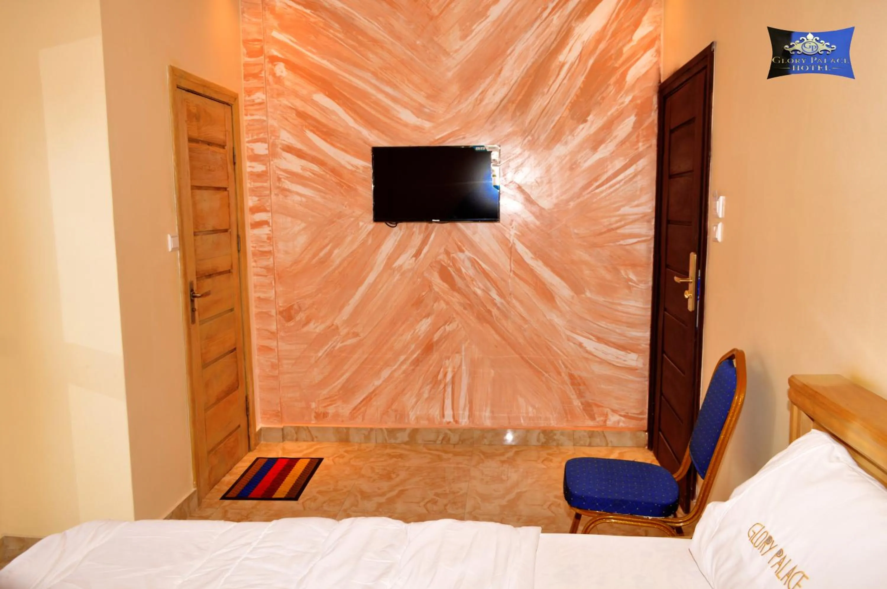 Bed in Glory Palace Hotel