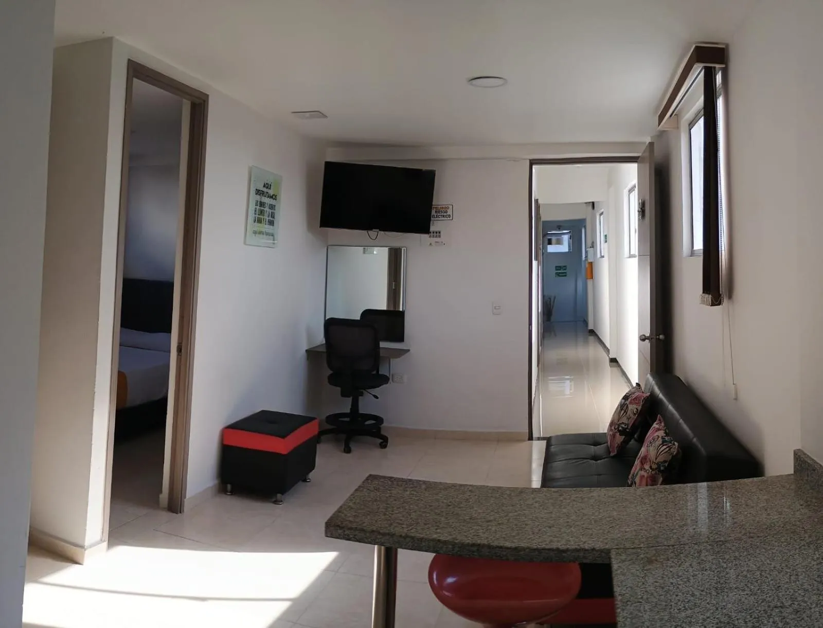 Communal lounge/ TV room in Hotel Cafe Estrella