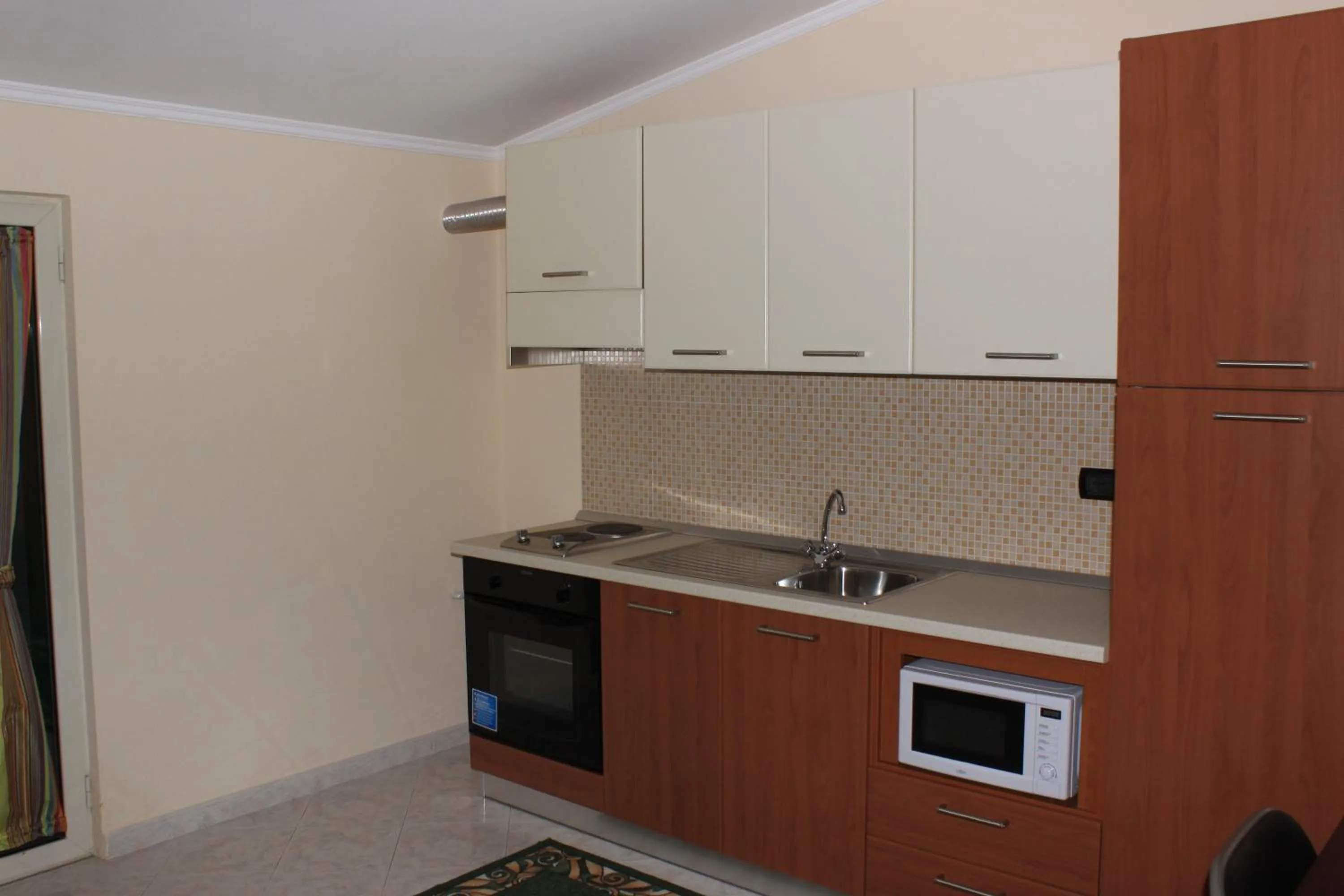 Kitchen or kitchenette in Hotel Mirage