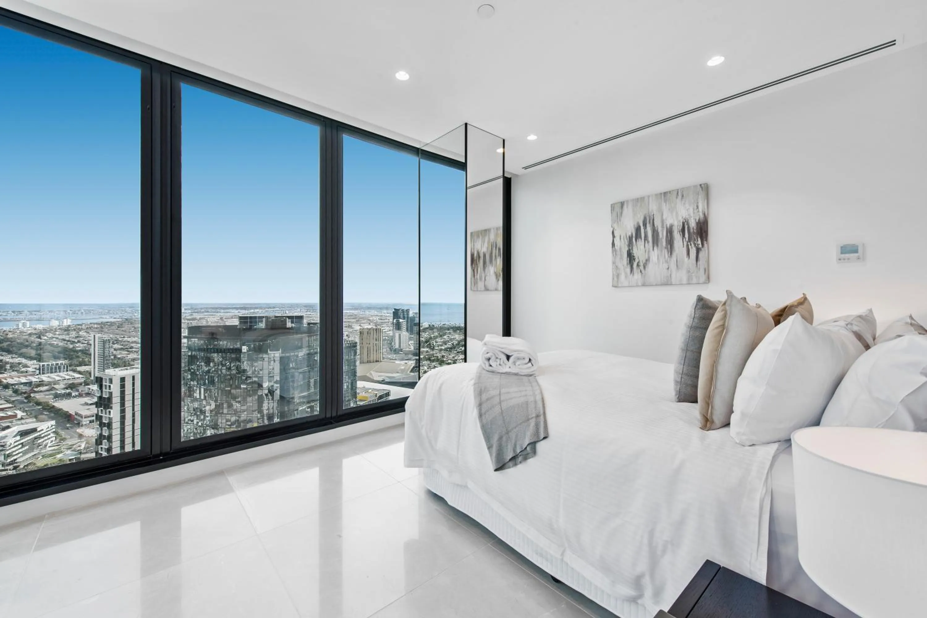 Bedroom, Bed in Melbourne City Apartments Panoramic Skyview Penthouse