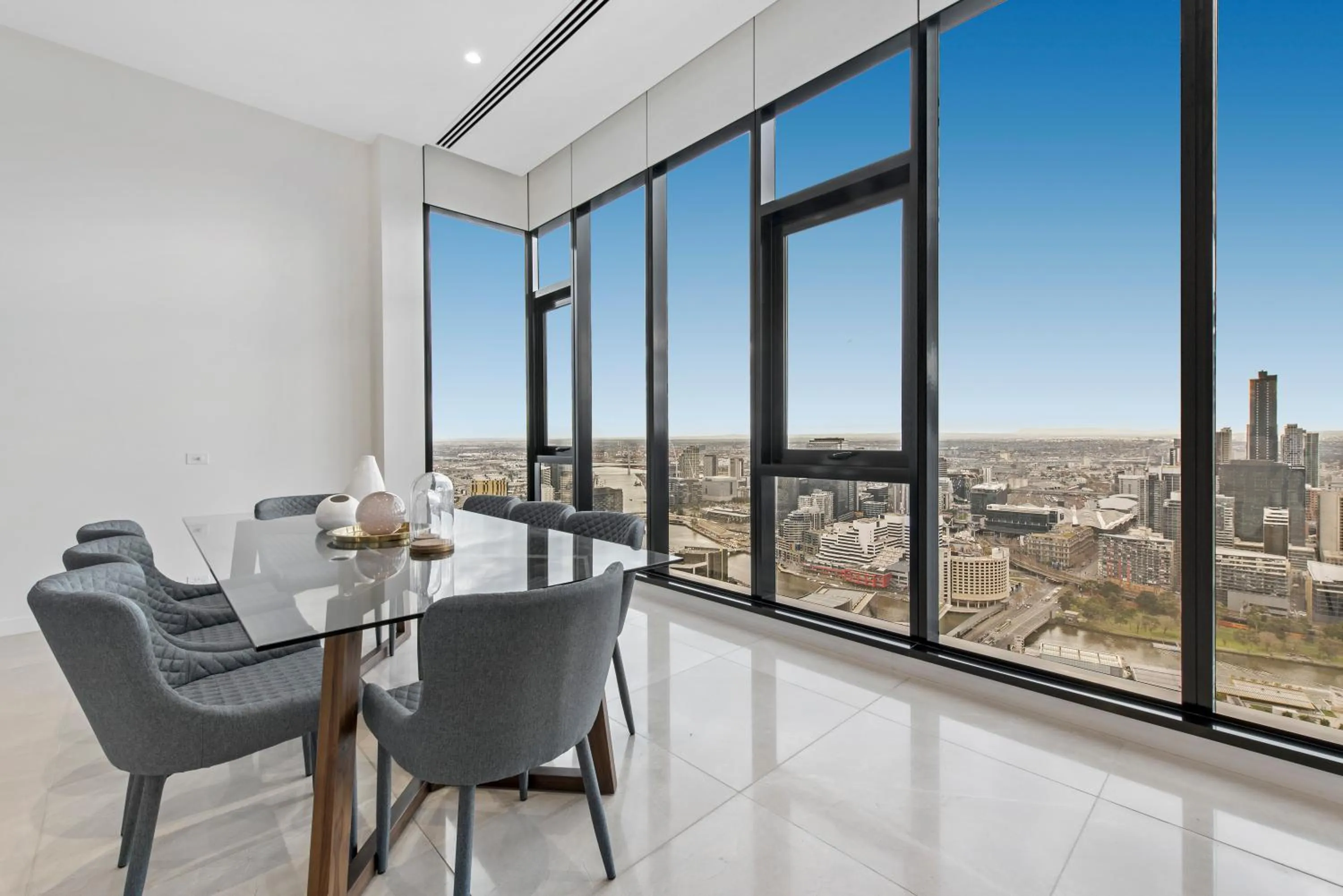 Dining area in Melbourne City Apartments Panoramic Skyview Penthouse