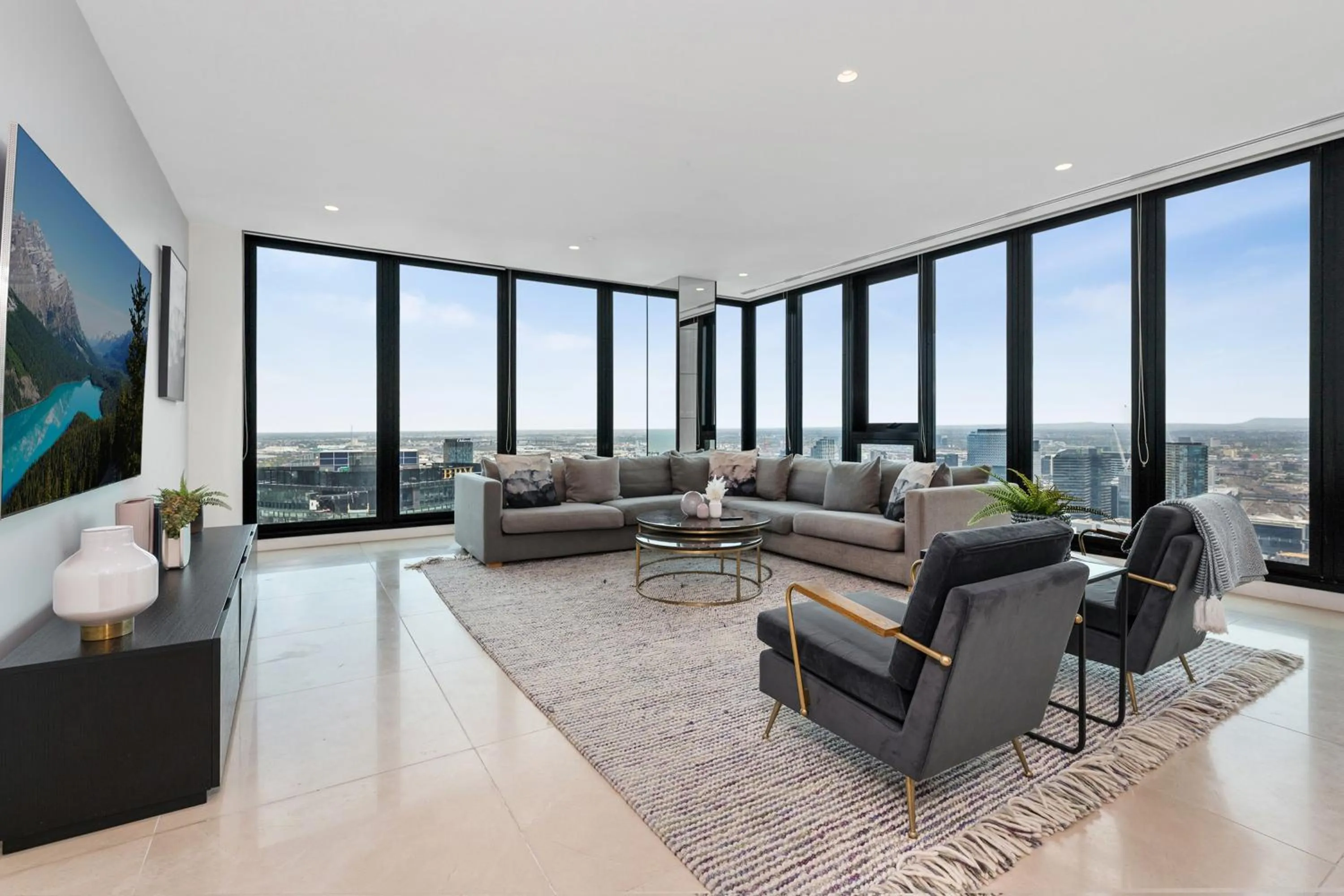 Living room in Melbourne City Apartments Panoramic Skyview Penthouse