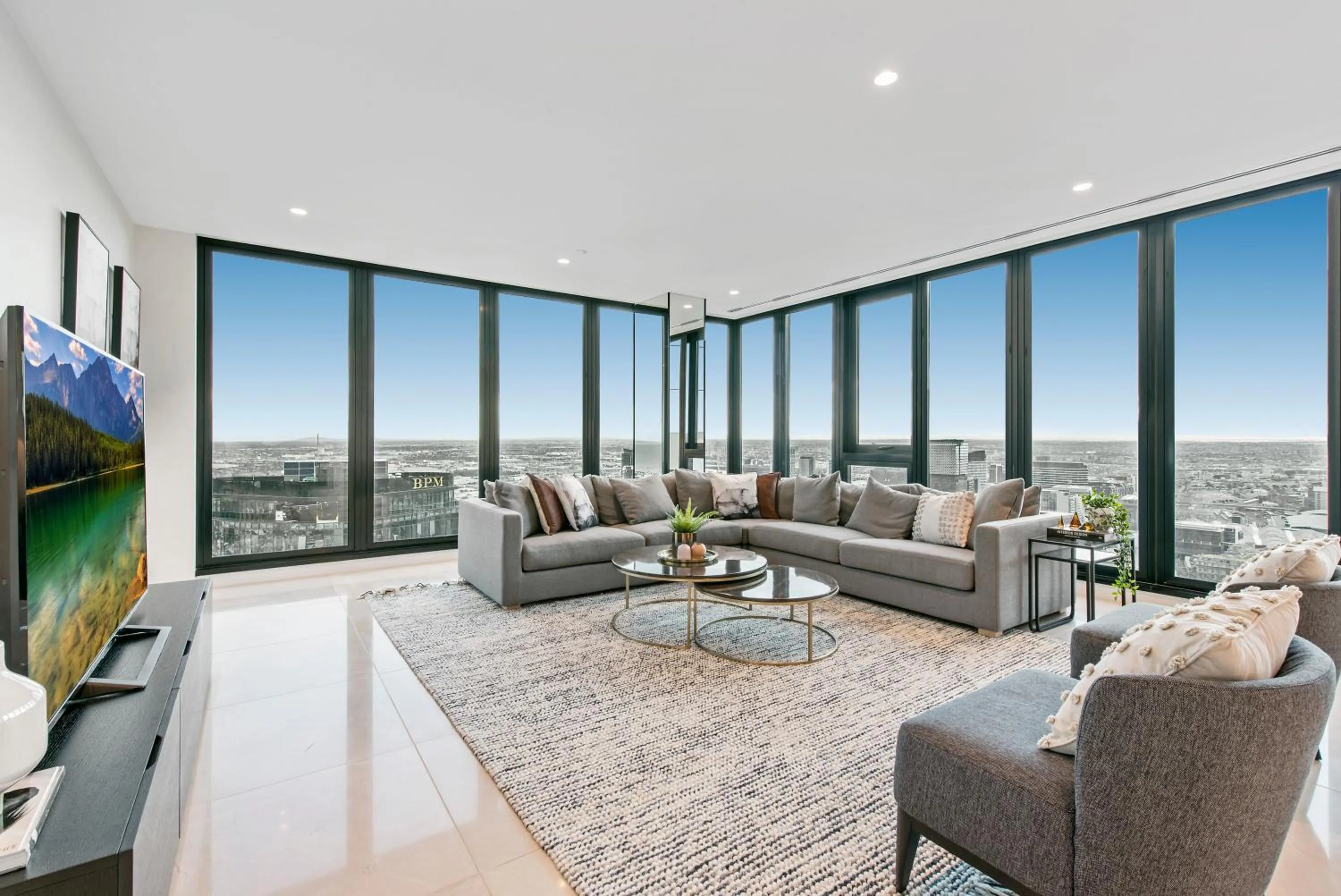 Living room in Melbourne City Apartments Panoramic Skyview Penthouse