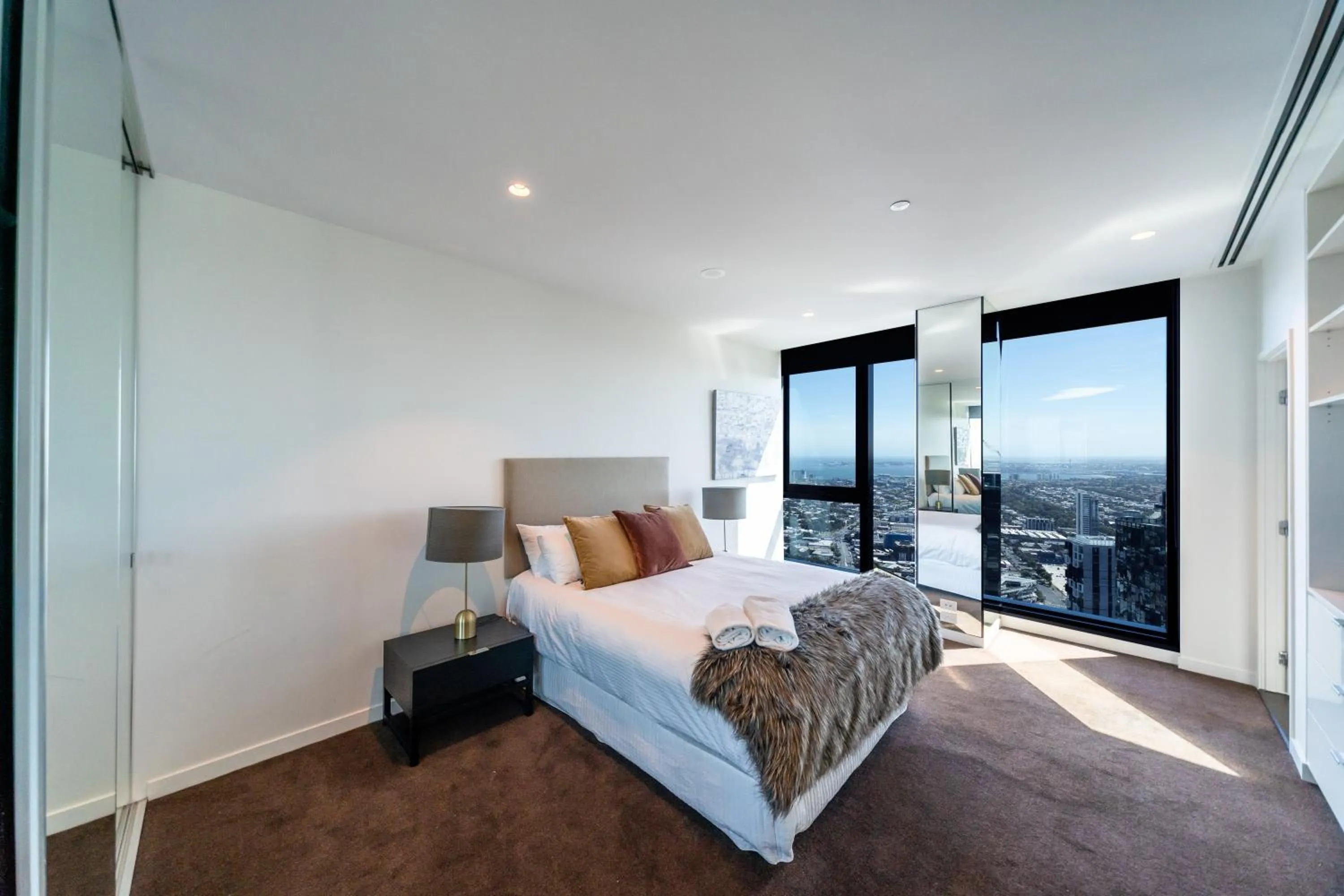 Bedroom, Bed in Melbourne City Apartments Panoramic Skyview Penthouse