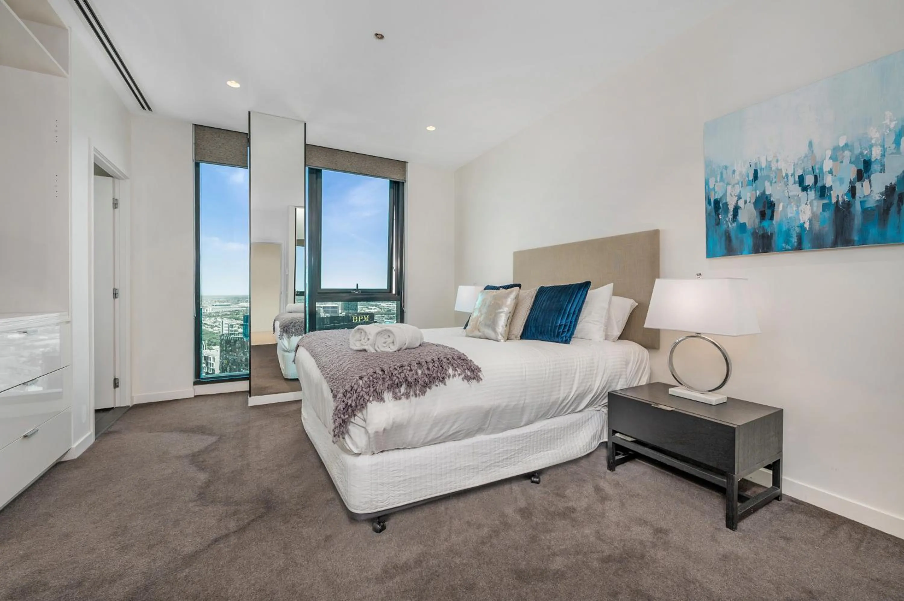 Bedroom, Bed in Melbourne City Apartments Panoramic Skyview Penthouse