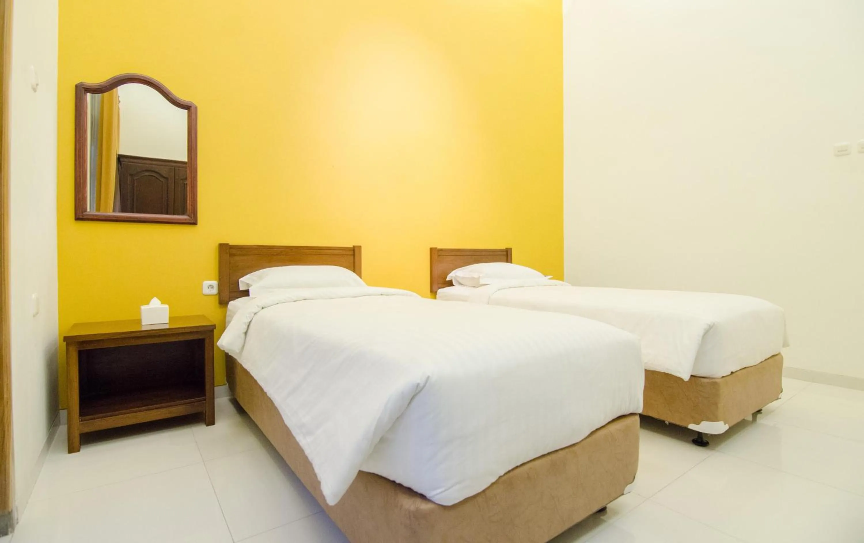 Bed in Helena Guest House