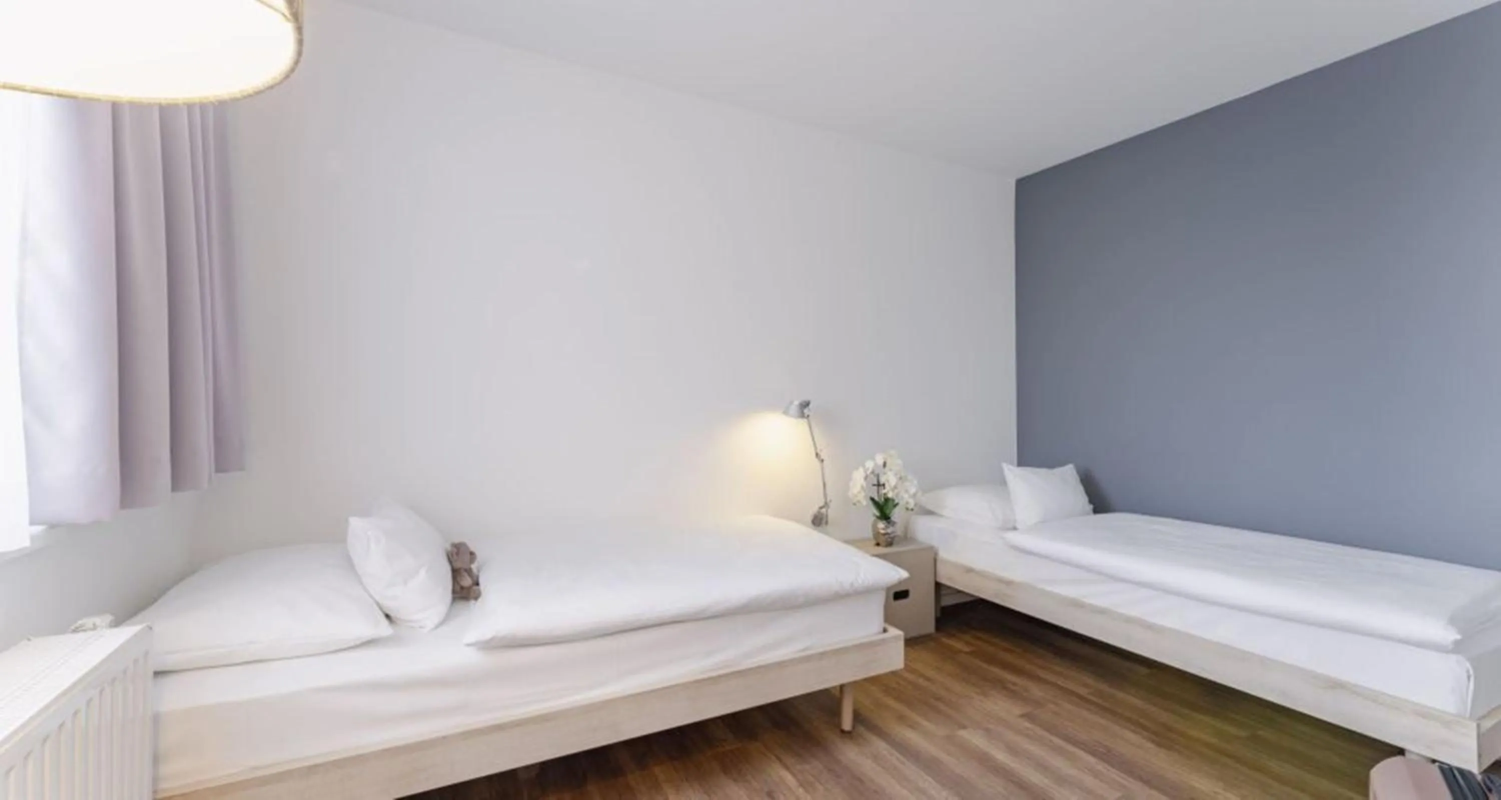 Bed in PLAZA INN Wien Gasometer