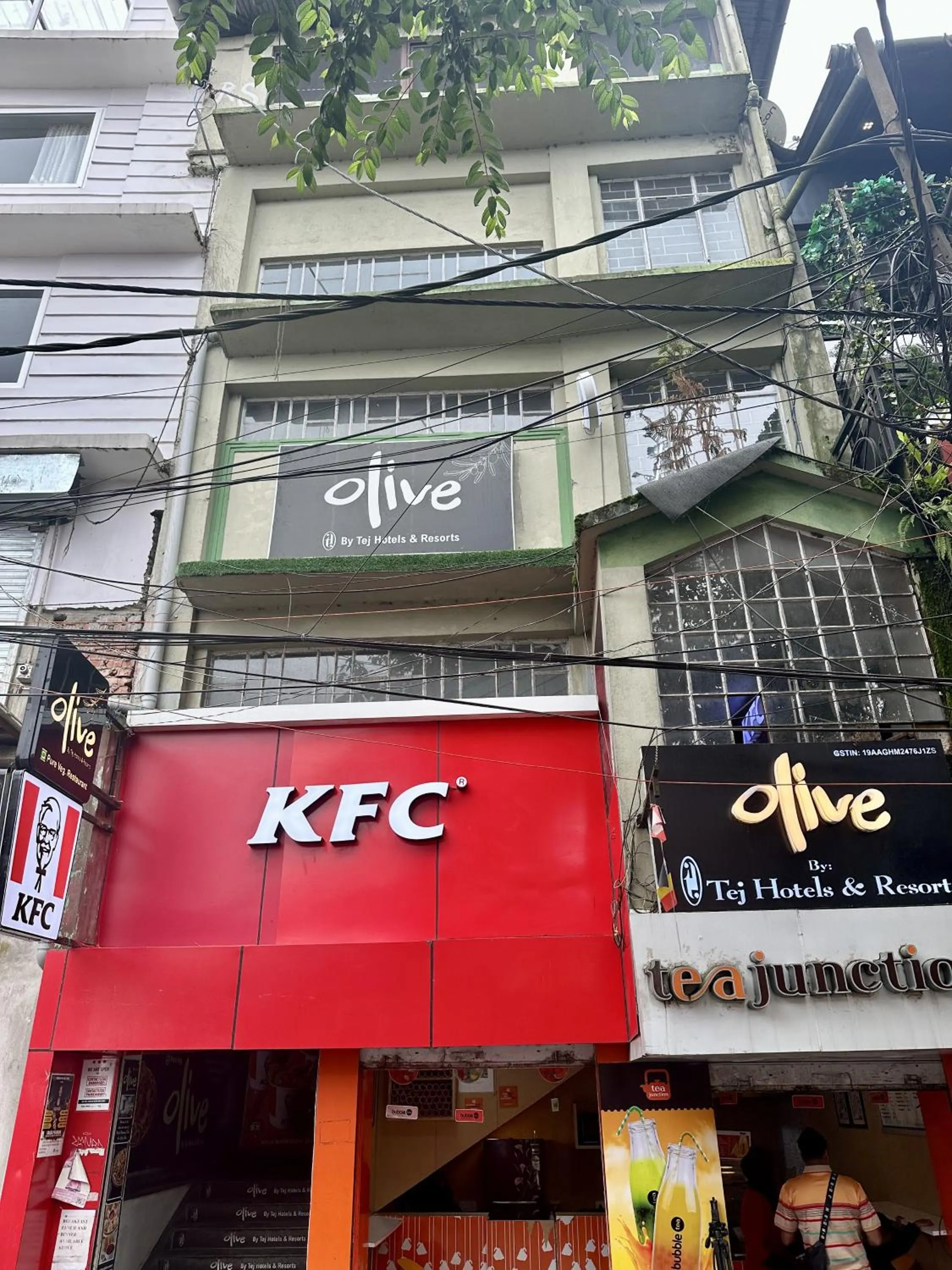 Property logo or sign in Olive By Tej Hotel And Resorts