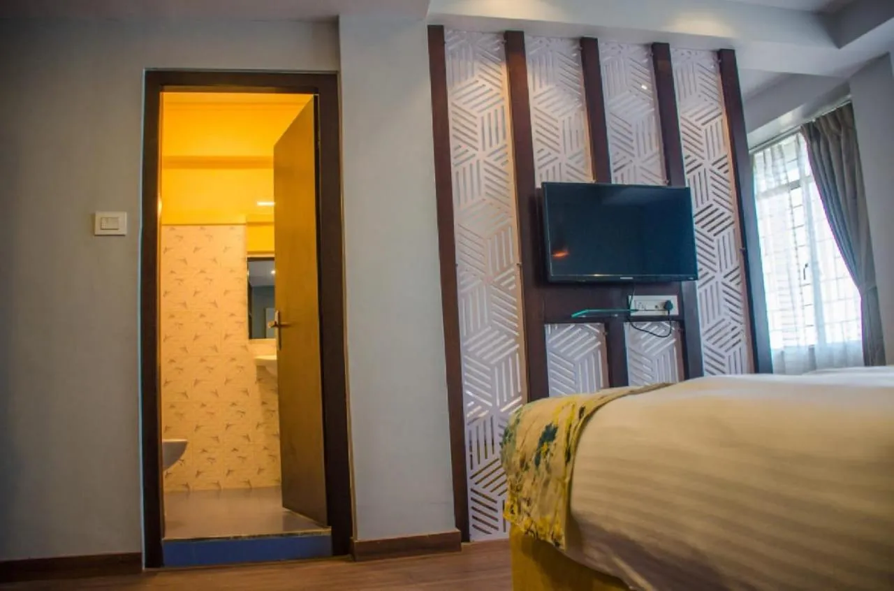 TV and multimedia, Bed in Olive By Tej Hotel And Resorts