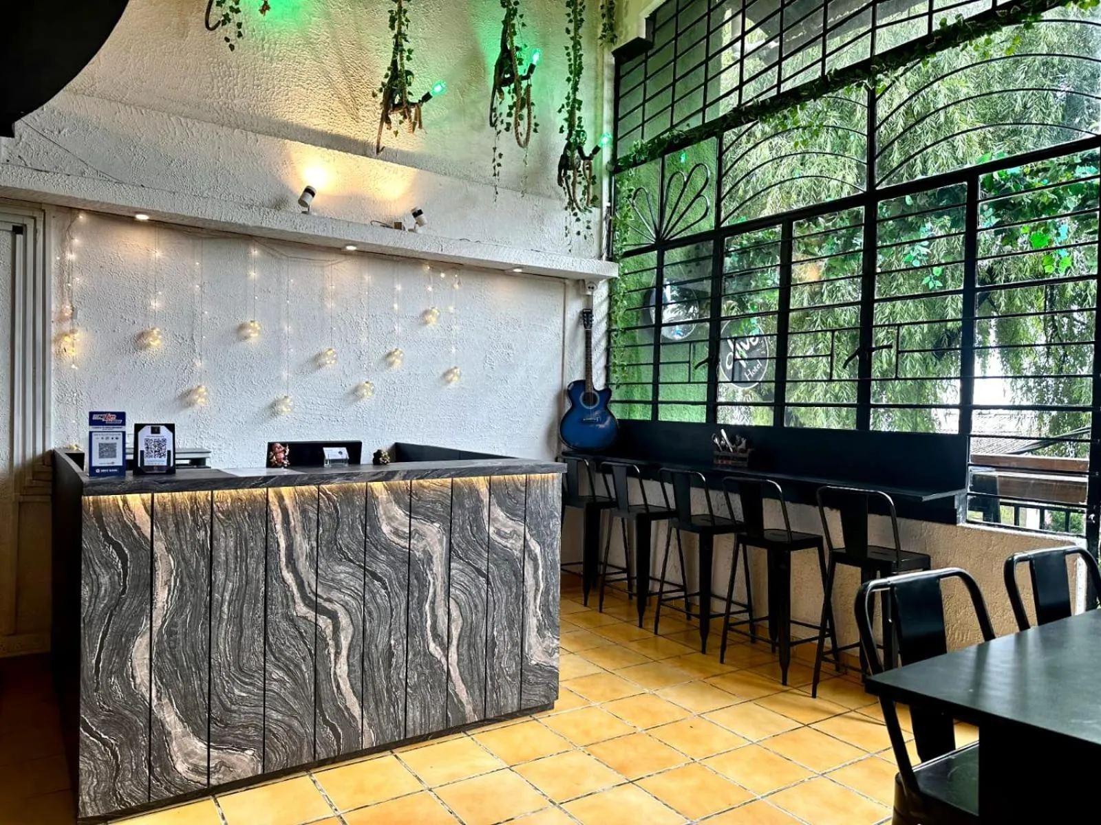 Text overlay in Olive By Tej Hotel And Resorts