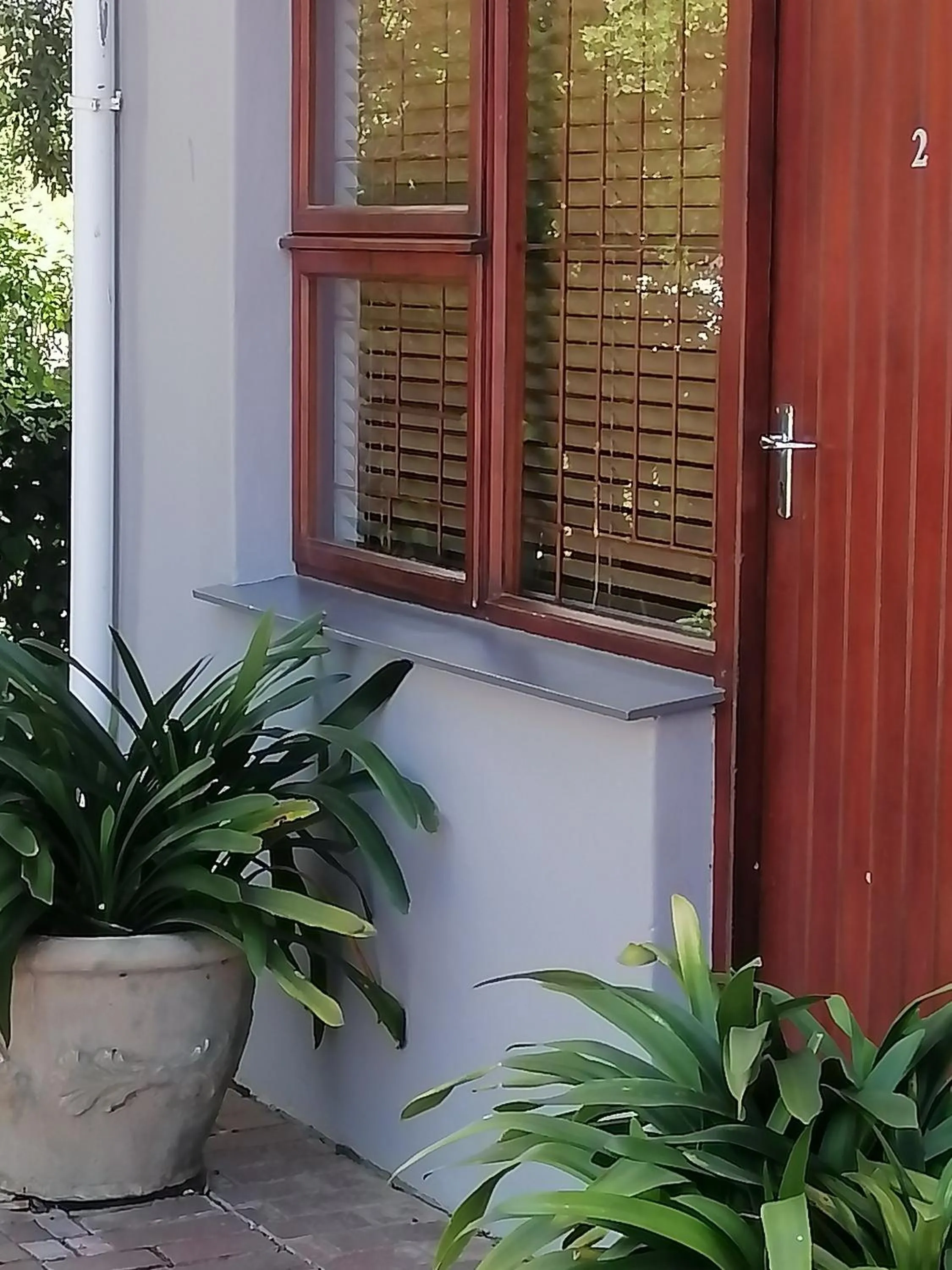 Facade/entrance in AVIENTO Guesthouse
