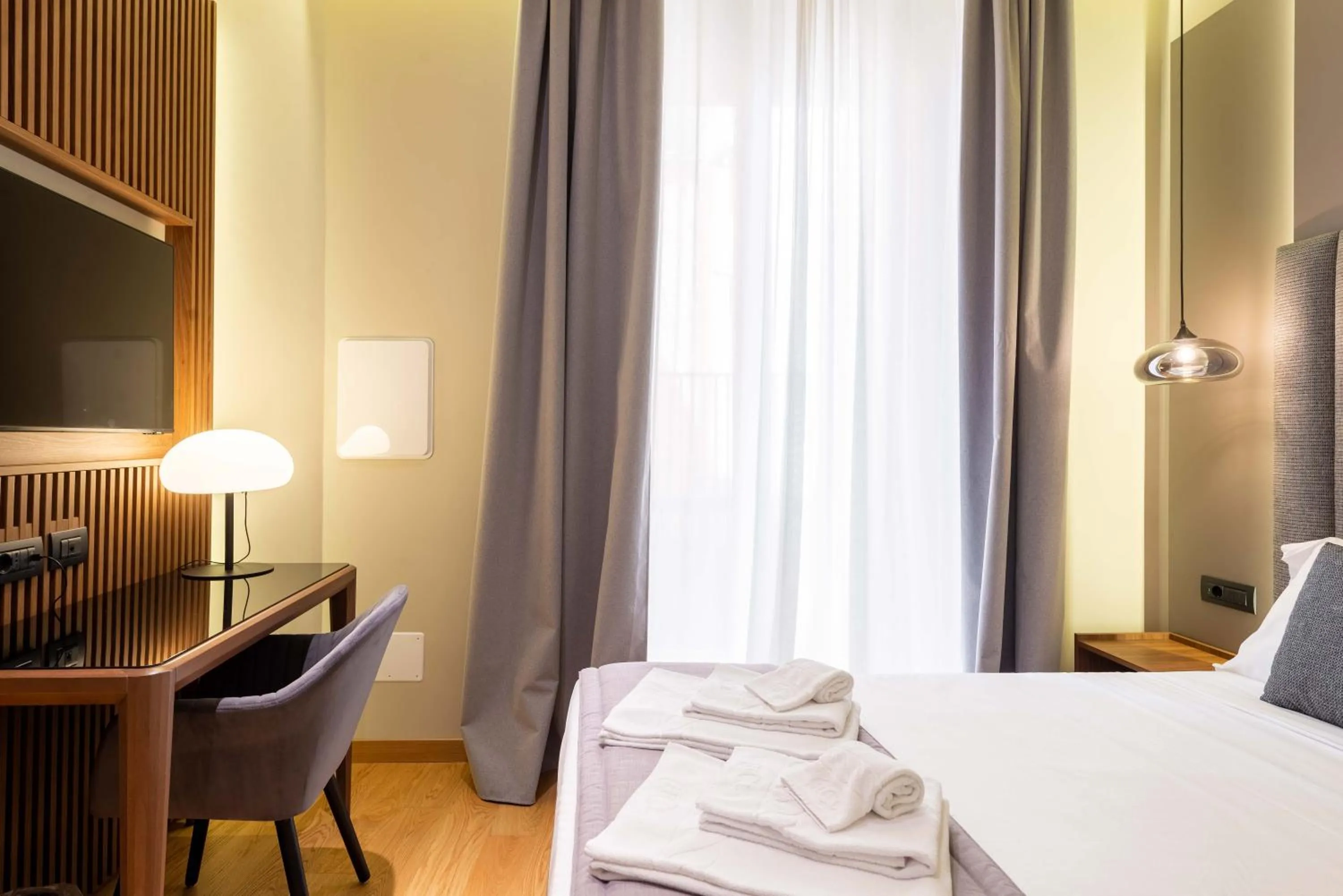 Bed in ELICAL Exclusive Private Suites