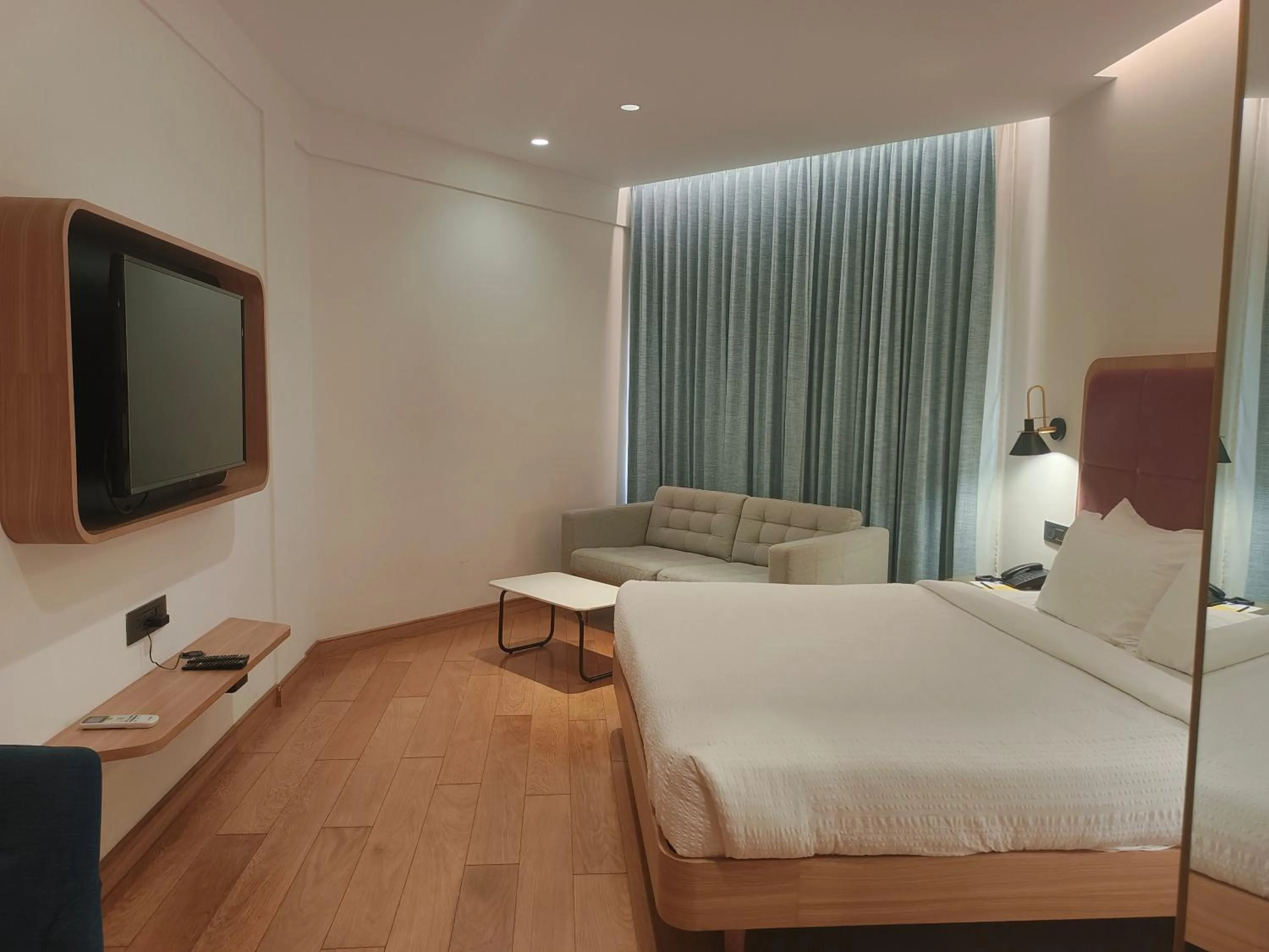 Bed in Manuelsons Malabar Palace