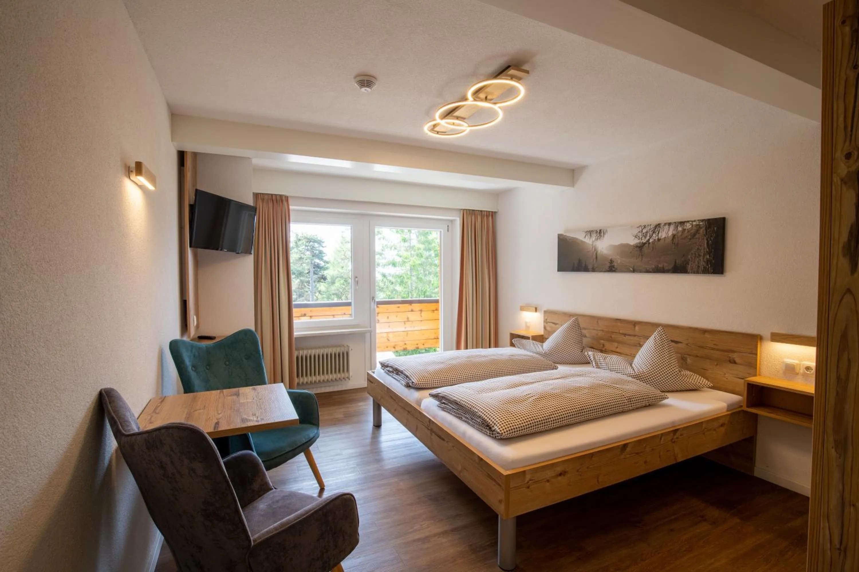 Bed in Hotel Pension Tyrol