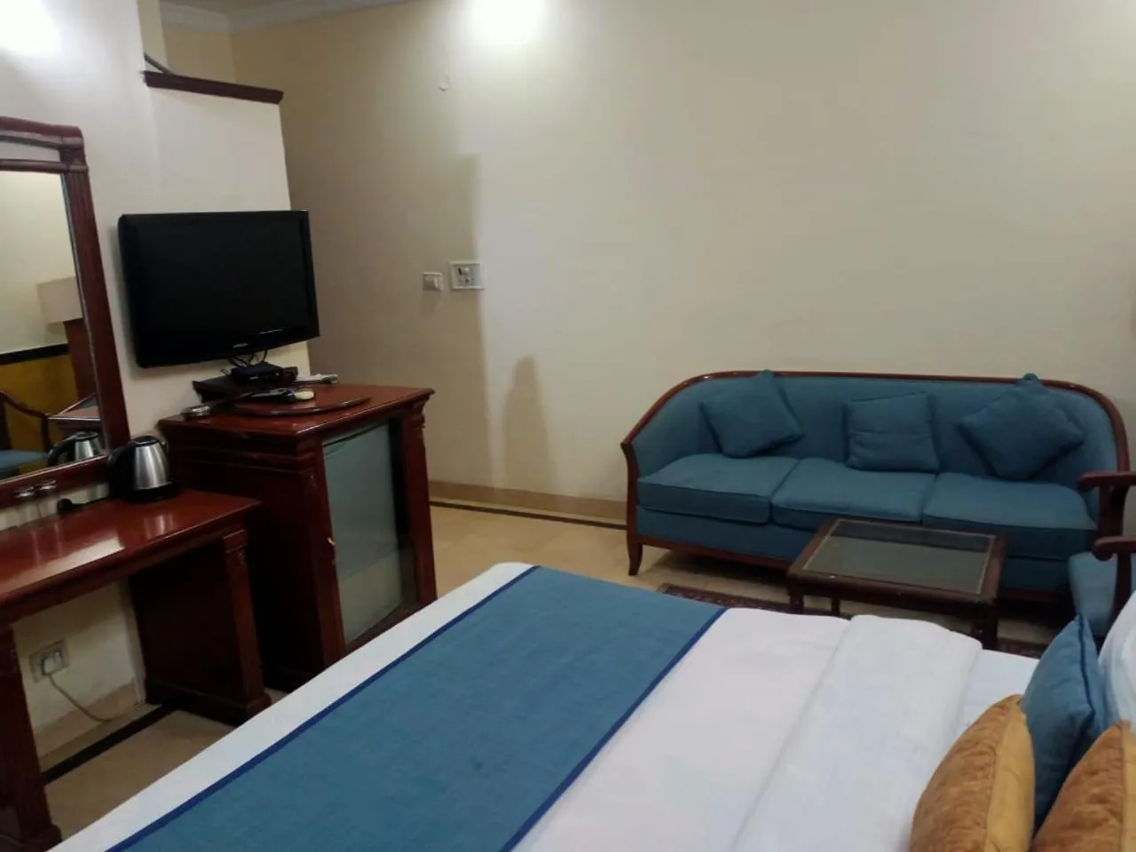 Bed in HOTEL CORPORATE INN