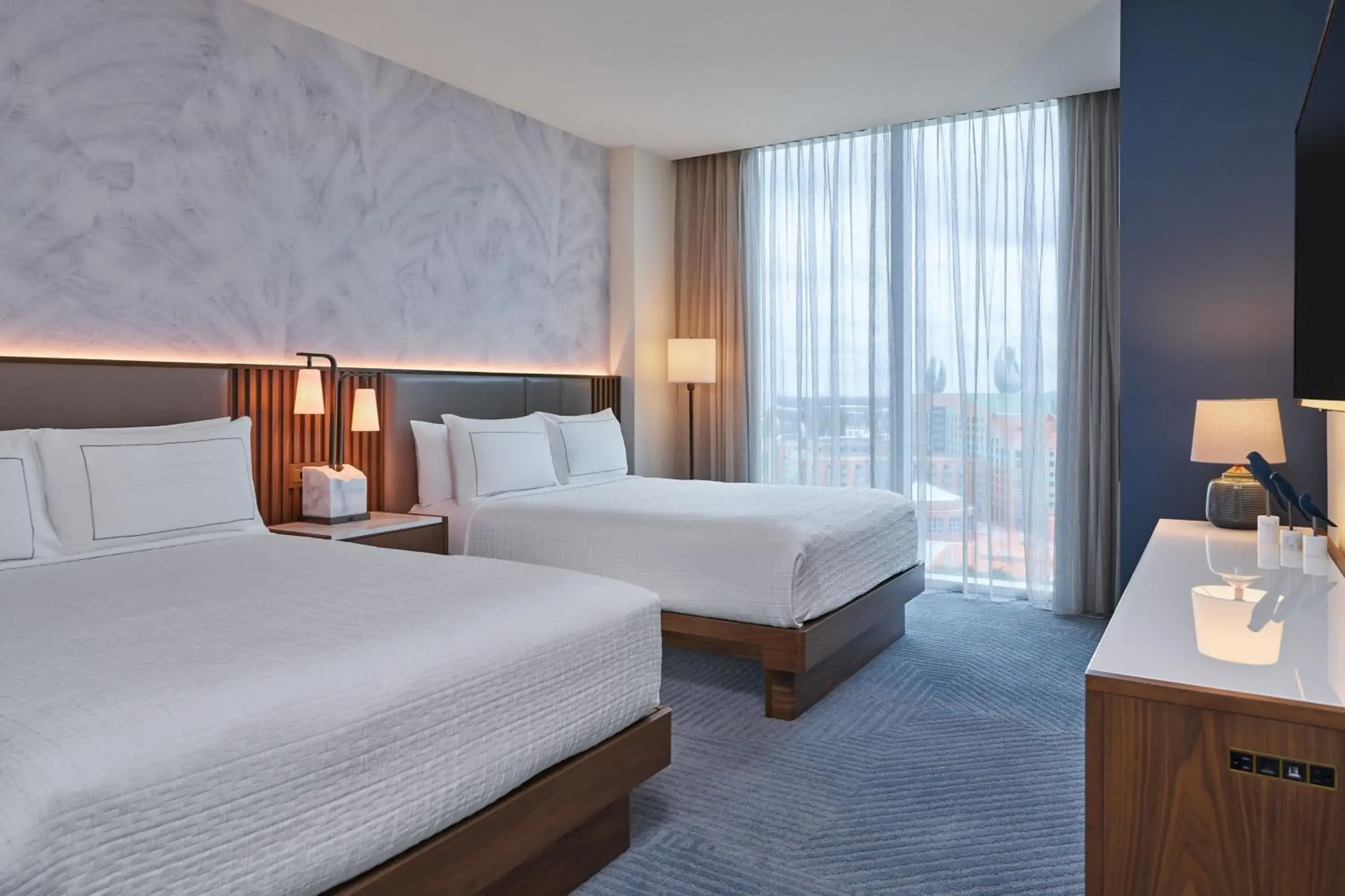 Traditional Queen Room with Two Queen Beds and Adapted Tub - Mobility and Hearing Accessible (Includes Early Entry To Disney Theme Parks) in Walt Disney World Swan Reserve Traditional Queen Room with Two Queen Beds and Adapted Tub - Mobility and Hearing Accessible (Includes Early Entry To Disney Theme Parks) in Walt Disney World Swan Reserve