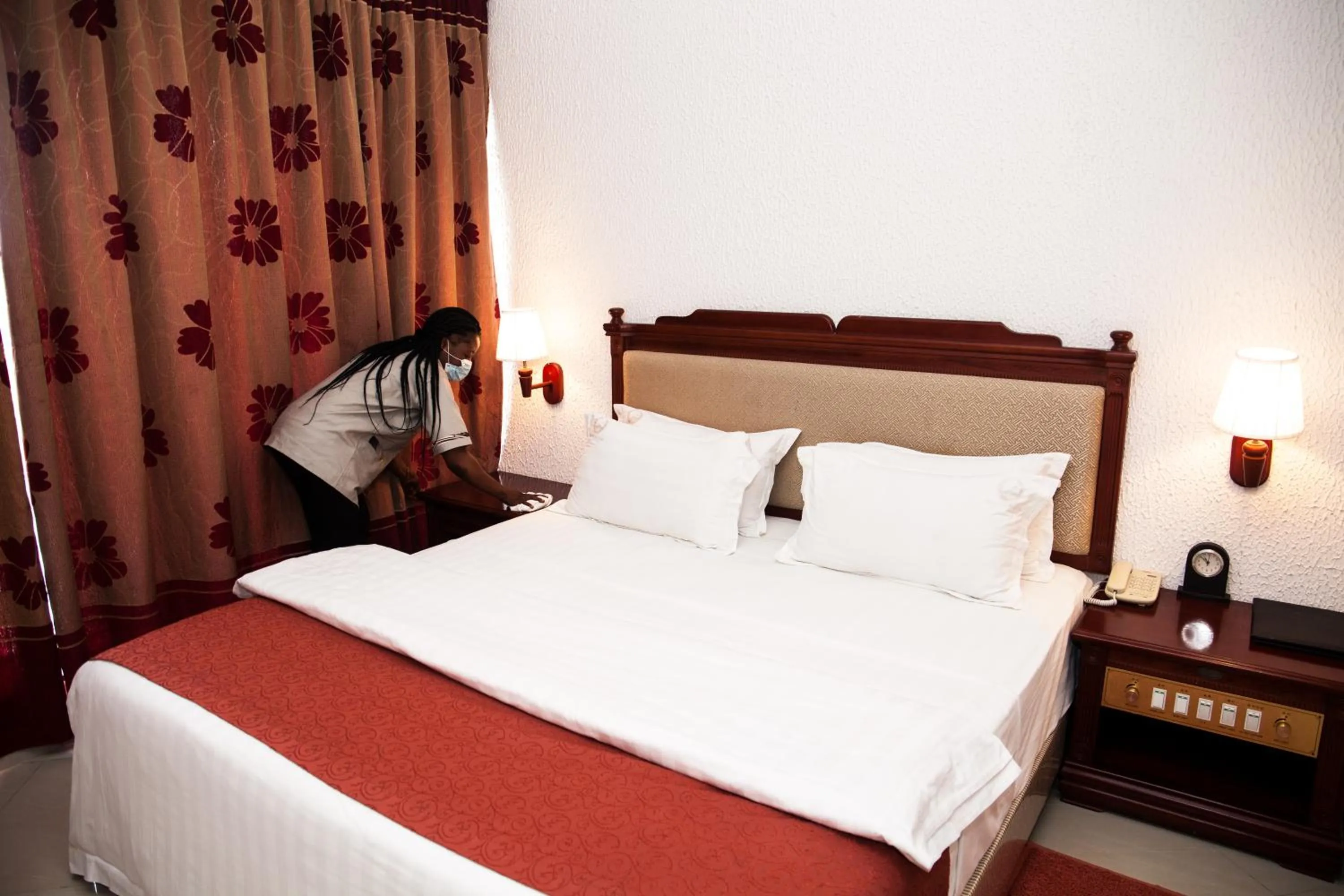 Bed in Millenium Popo Beach Hotel