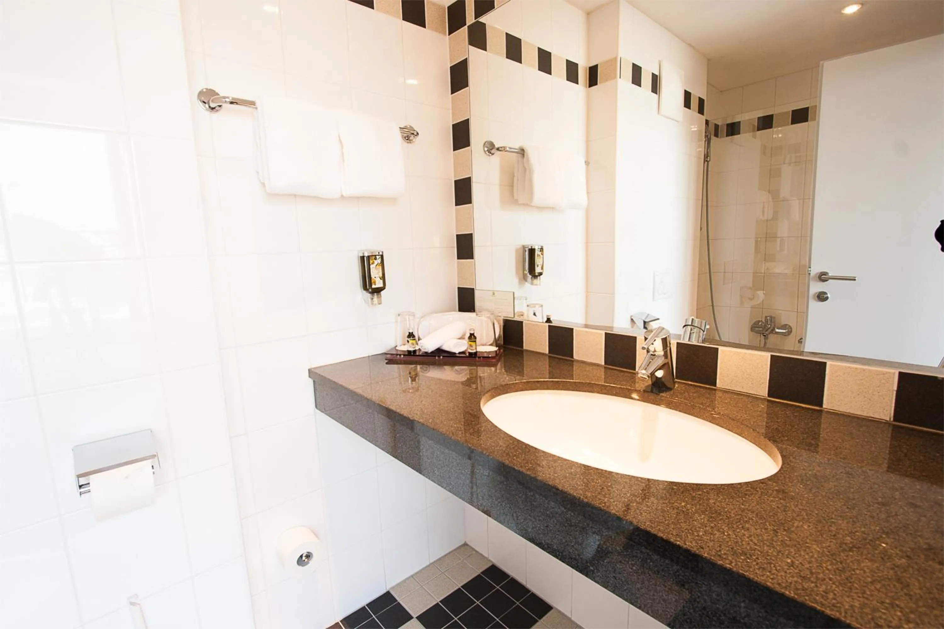 Bathroom in Holiday Inn - Salzburg City by IHG