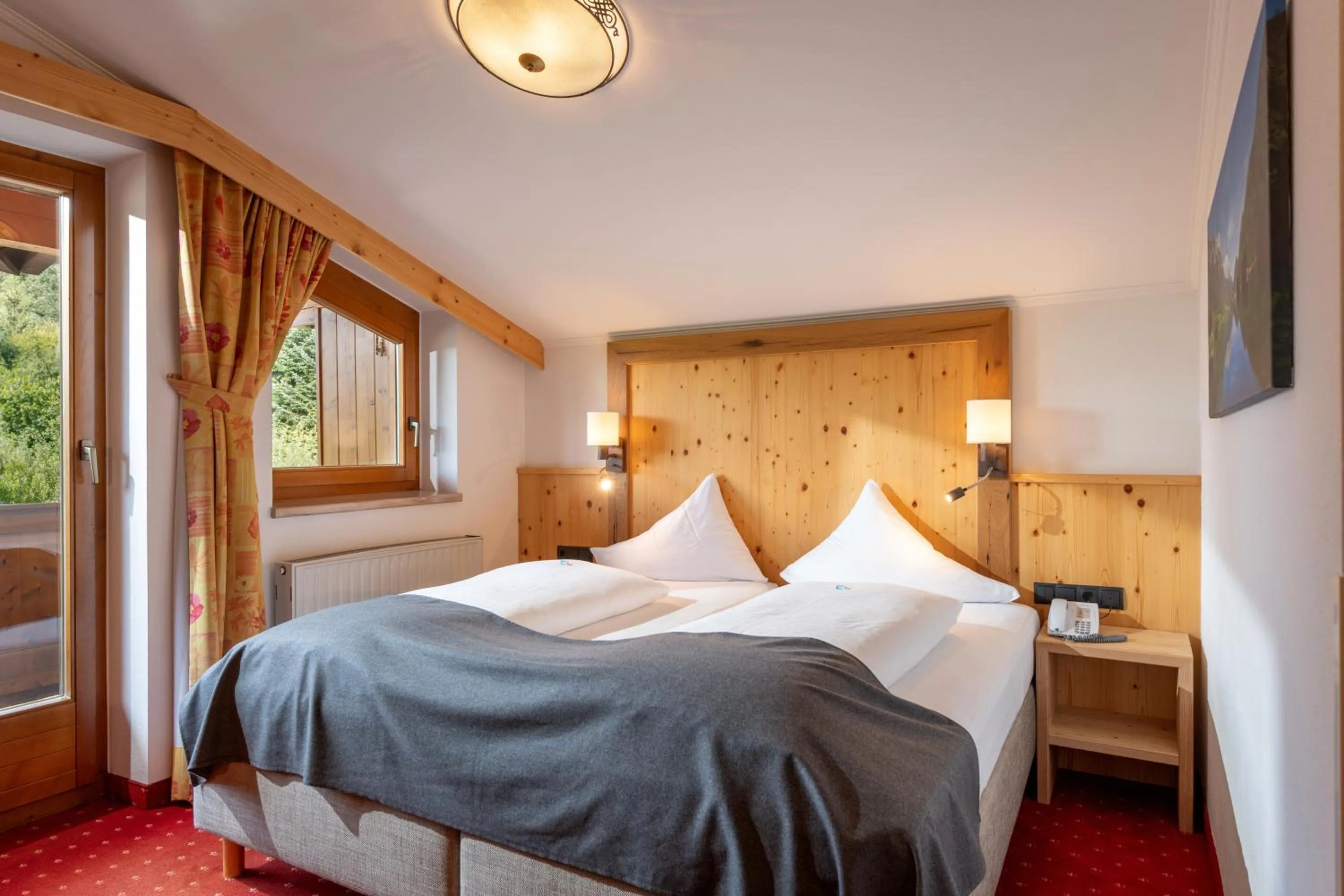 Bed in Hotel Alpenpanorama