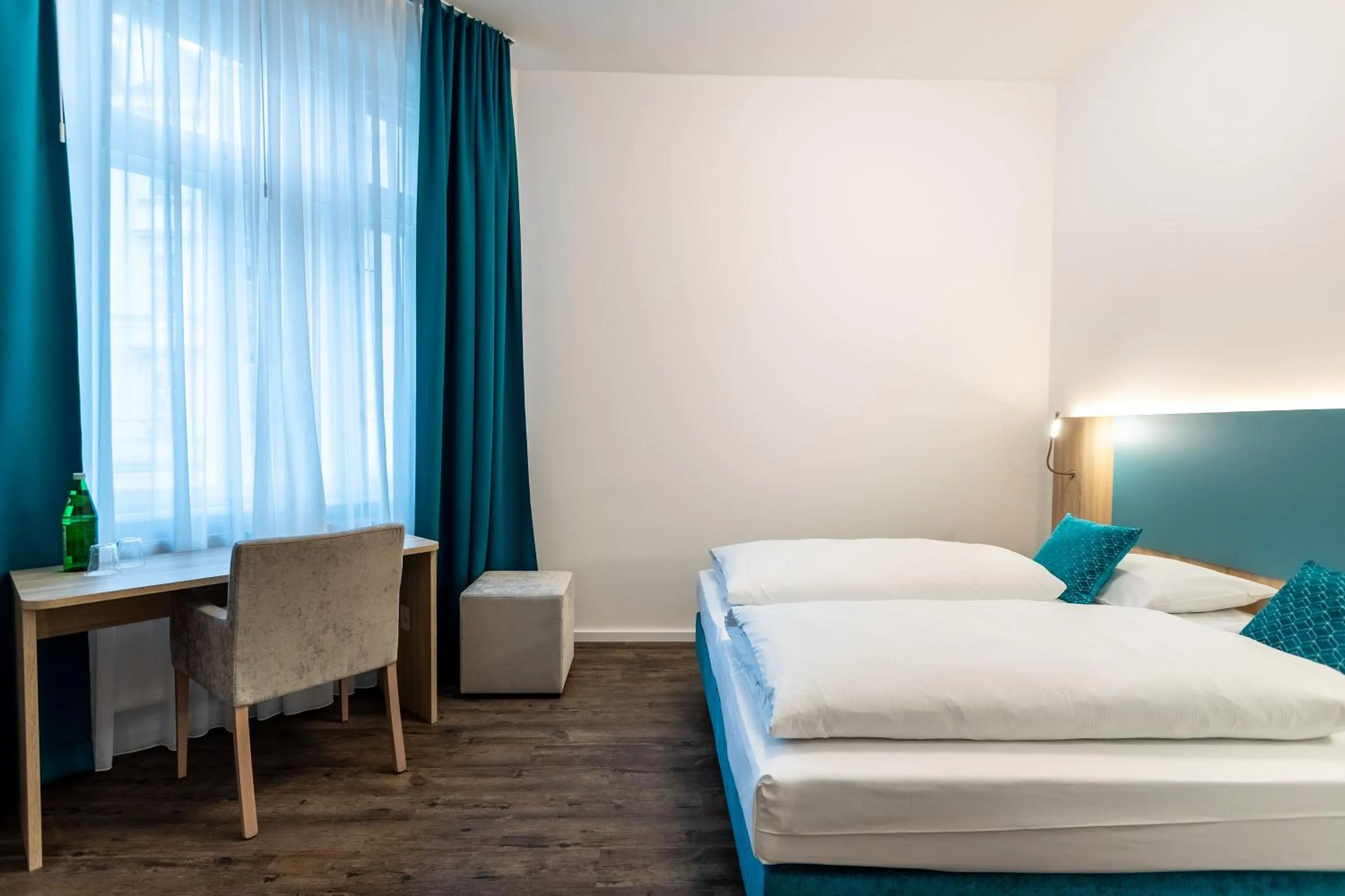 Bed in DaunTown Rooms - Self Check-In