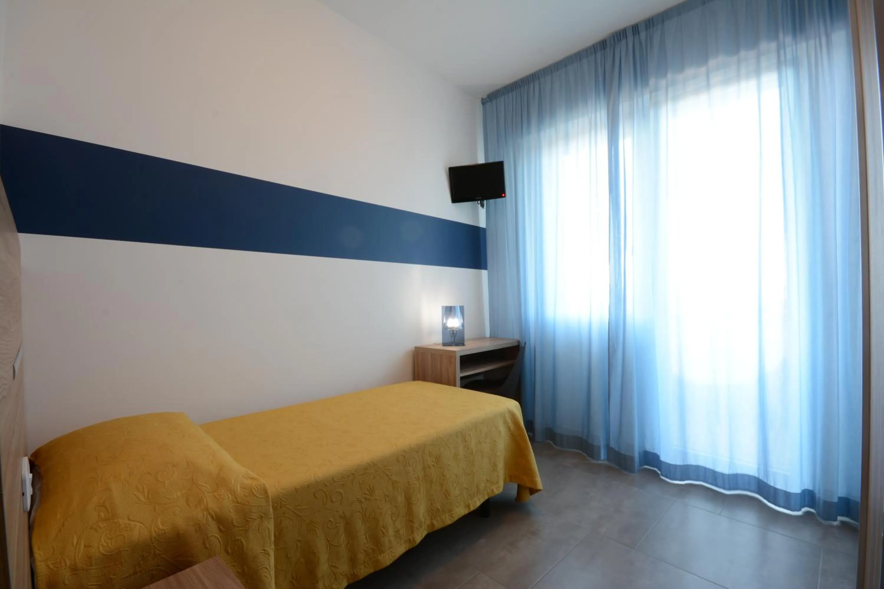 Bed in Hotel Caravelle