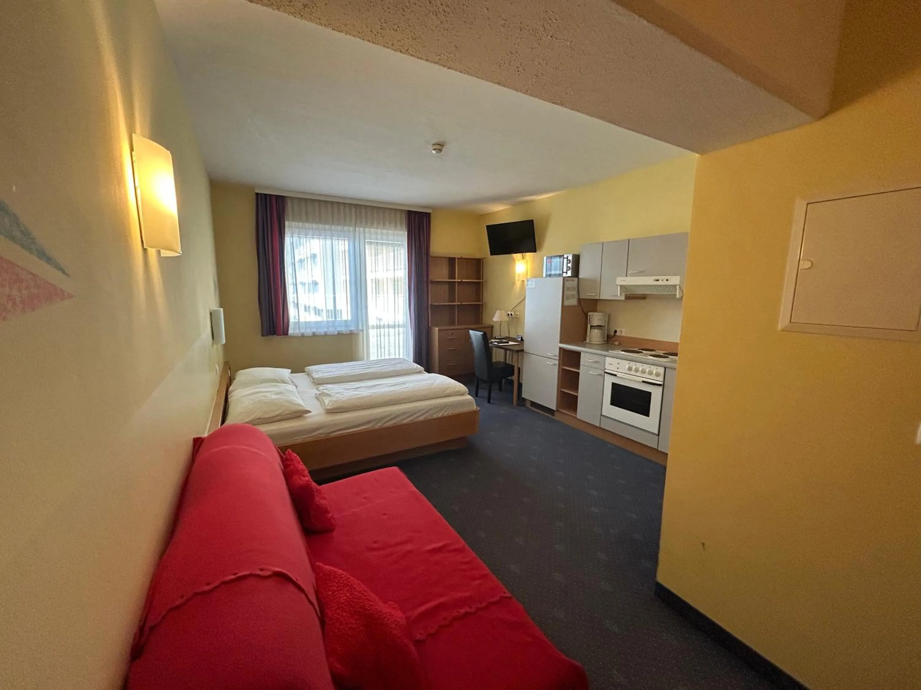 Bed in NOVAPARK Flugzeughotel Graz