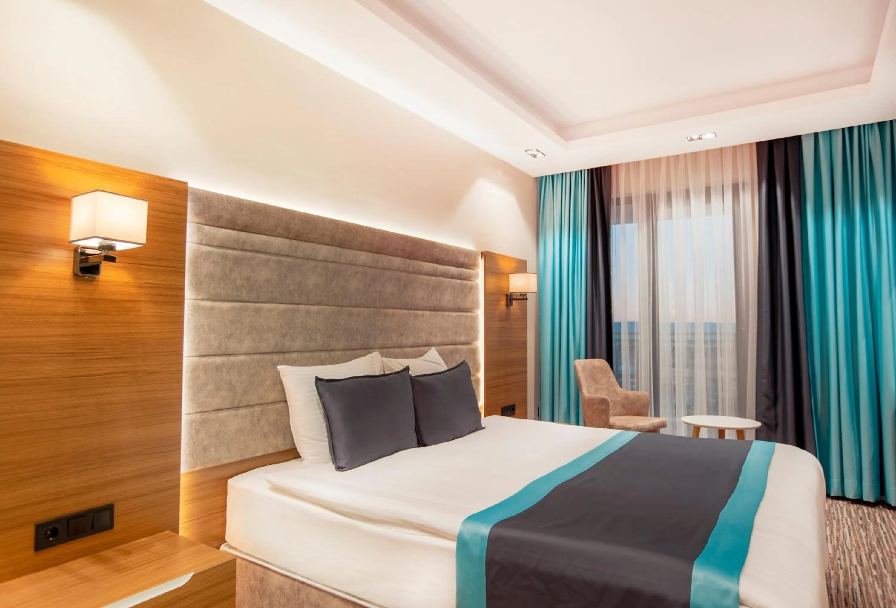 Bed in Elifim Resort Hotel