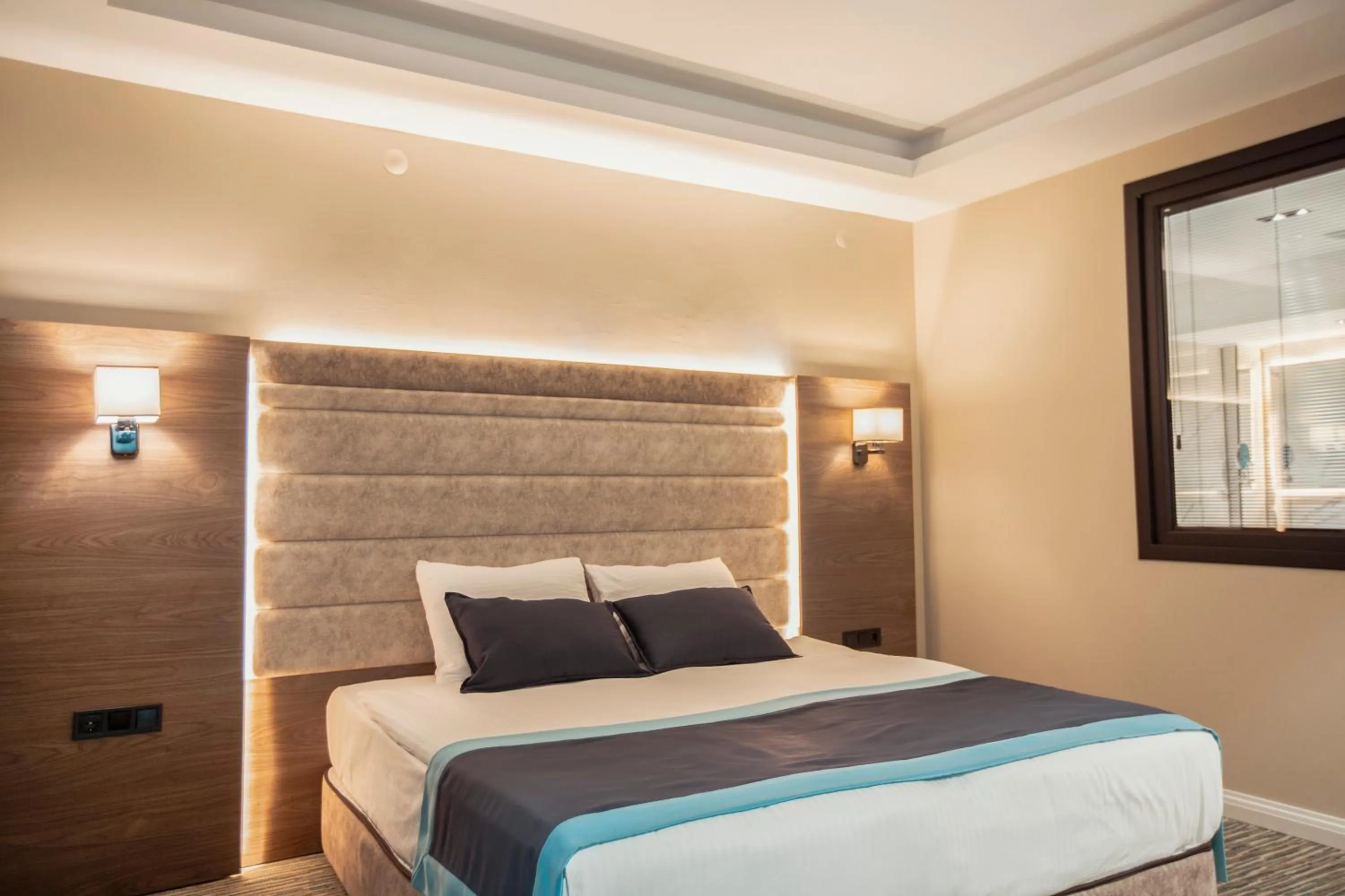 Bed in Elifim Resort Hotel