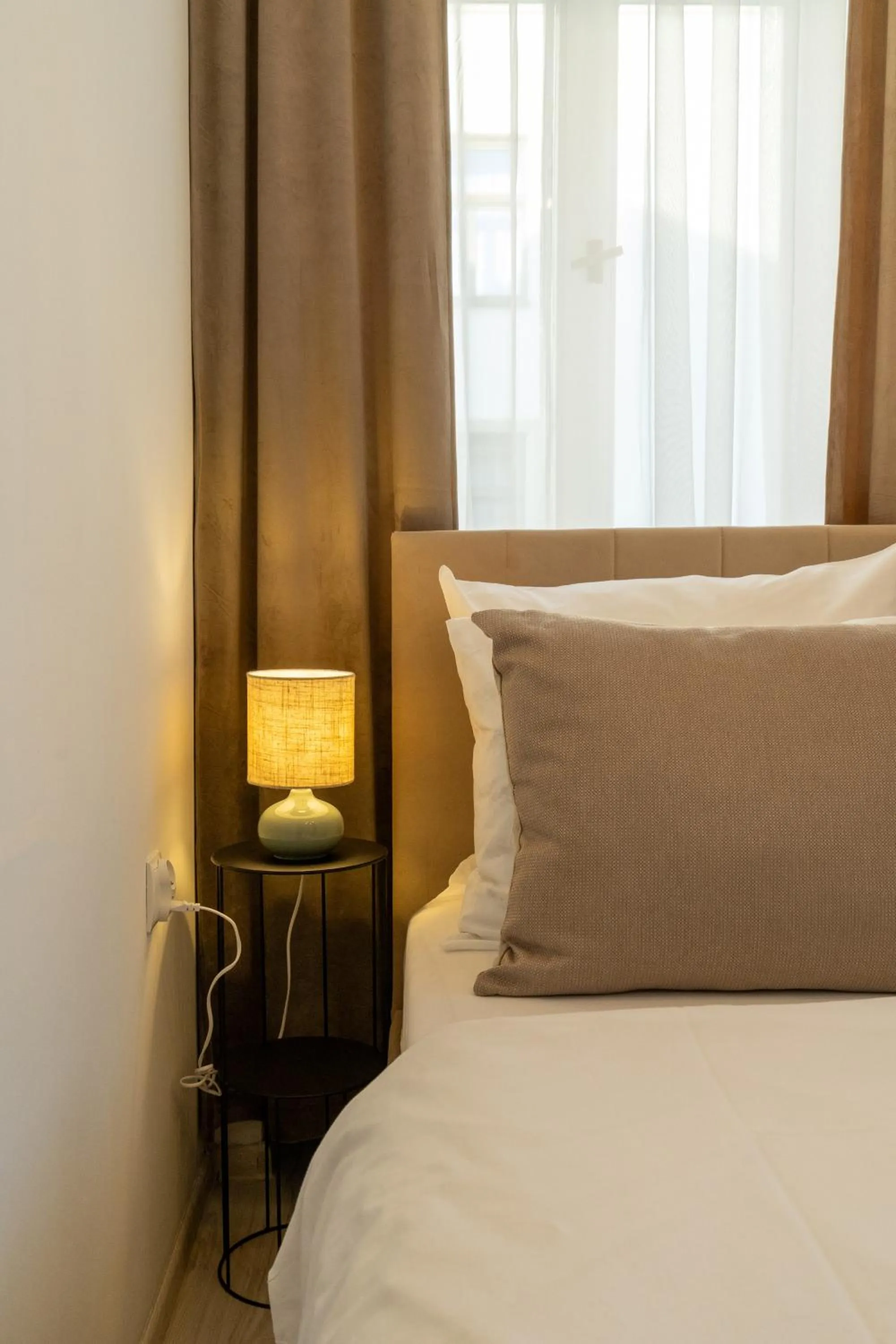 Decorative detail, Bed in Kazimierz Residence Apartments by Staymoovers