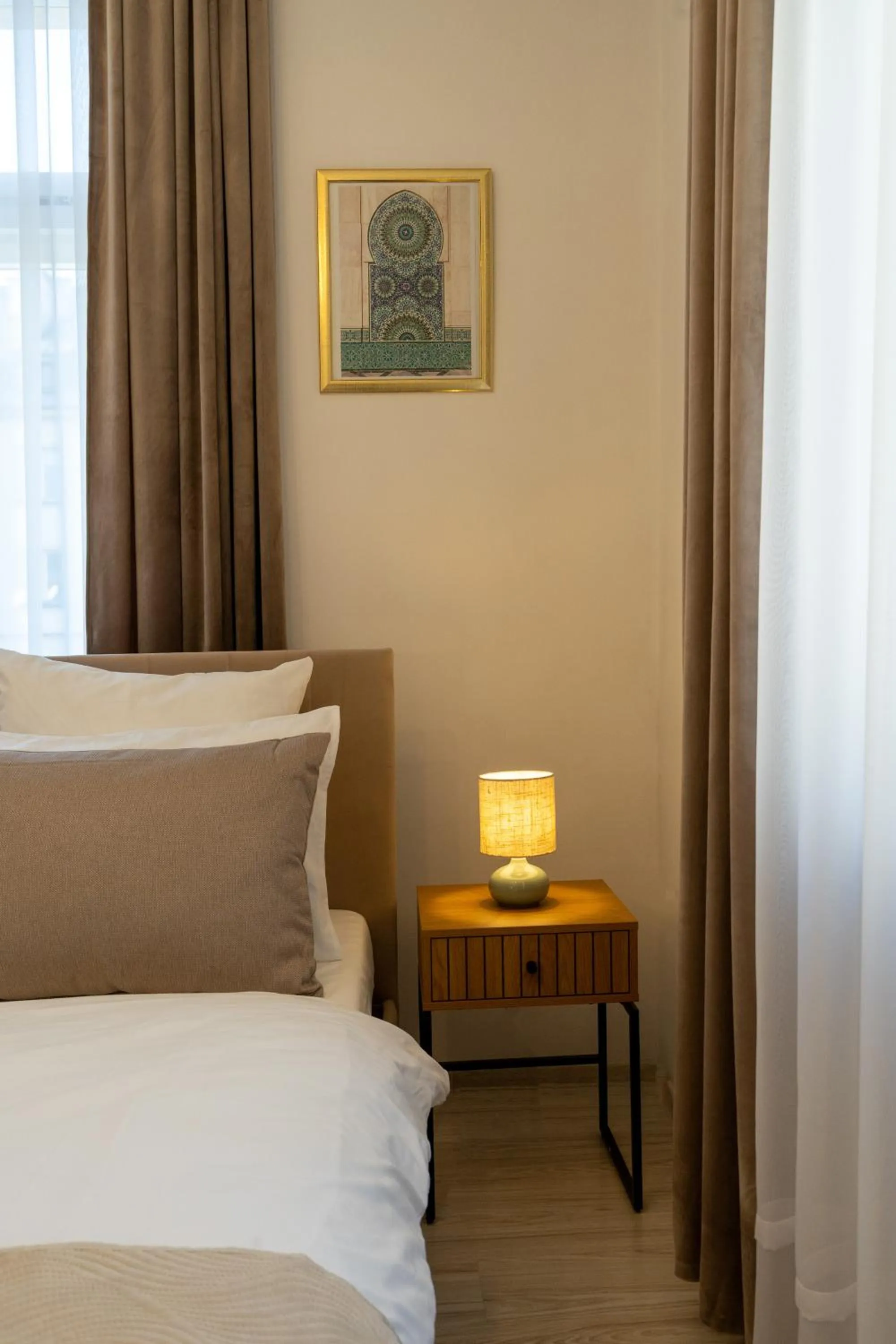 Decorative detail, Bed in Kazimierz Residence Apartments by Staymoovers