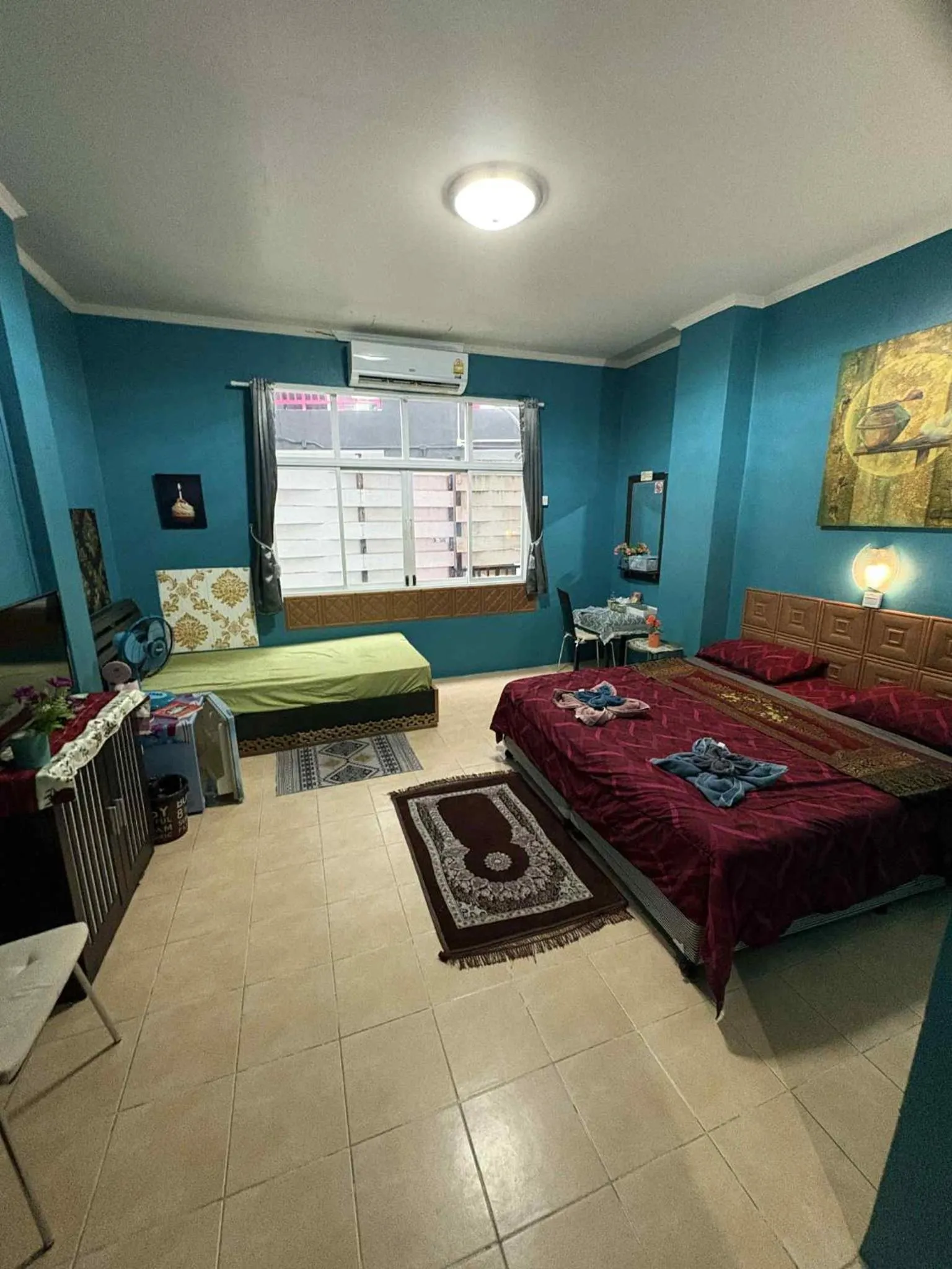 Bed in San Antonio Beach Guesthouse & Restaurant